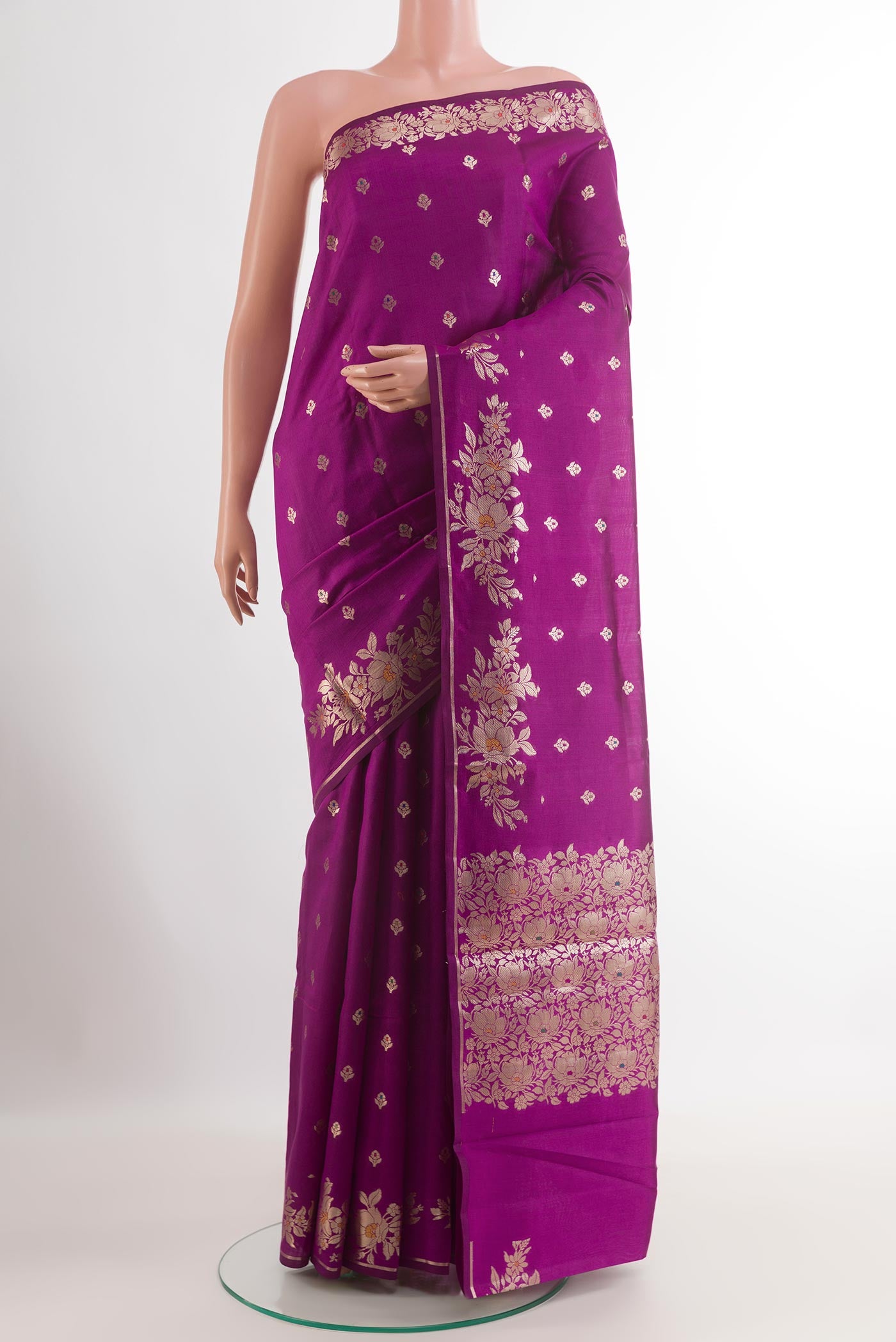 Purple Tussar Silk Saree with Zari Butta on the body and Zari Border.  displayed on a mannequin