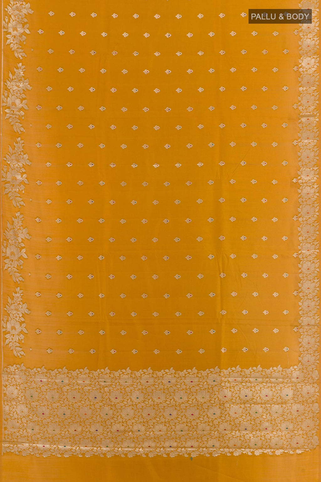 Flat view of Yellow Tussar Silk Saree with Zari Butta on the body and Zari Border. 