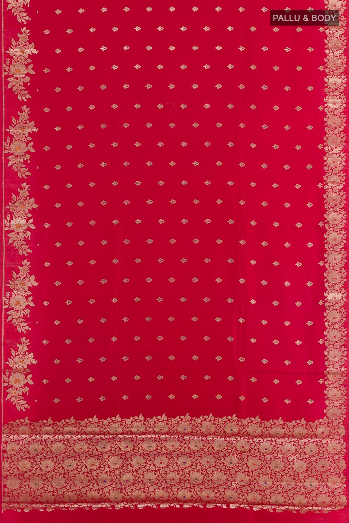 Flat view of Red Tussar Silk Saree with Zari Butta on the body and Zari Border. 
