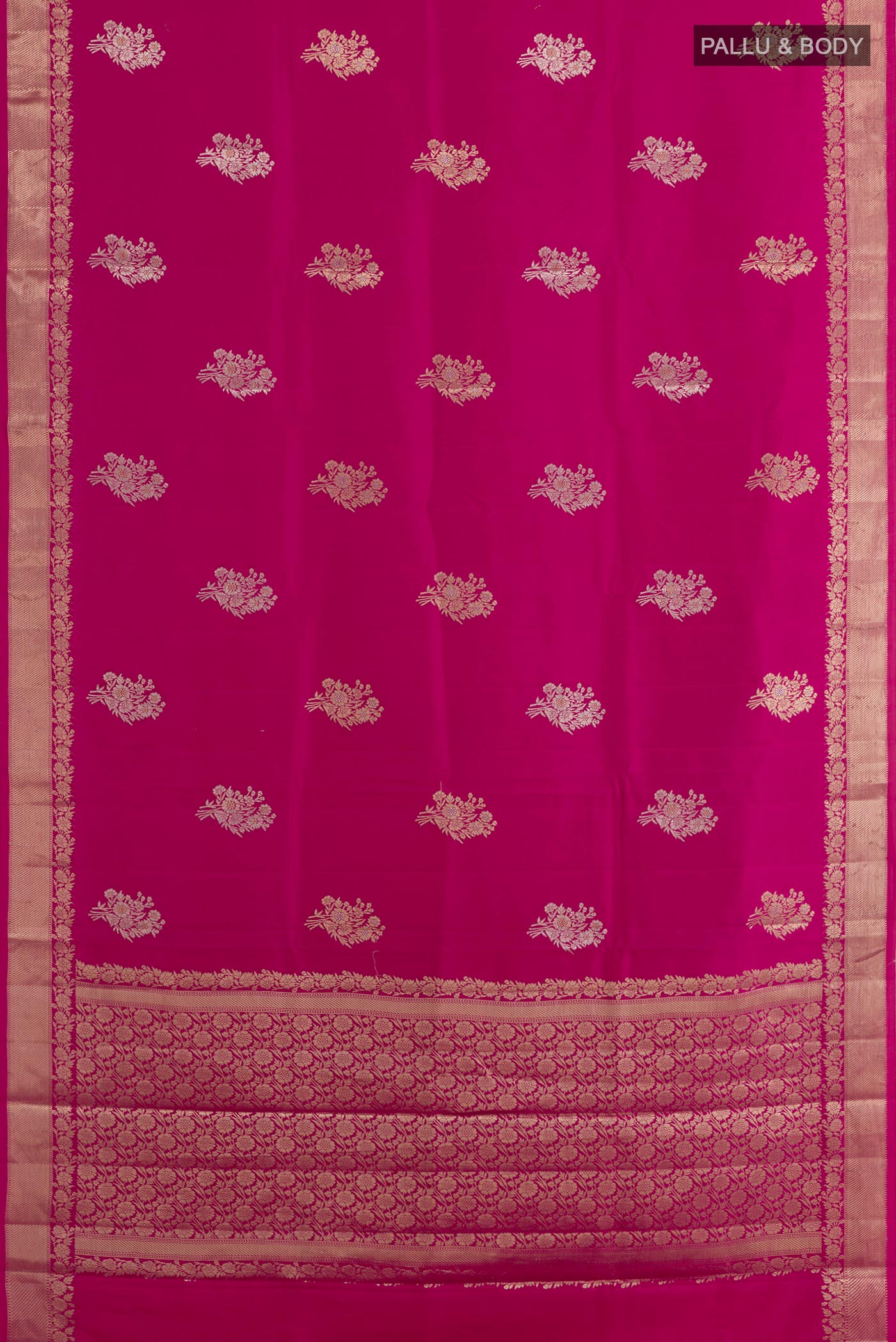 Flat view of Pink Tussar Silk Saree with Zari Butta on the body and Zari Border. 