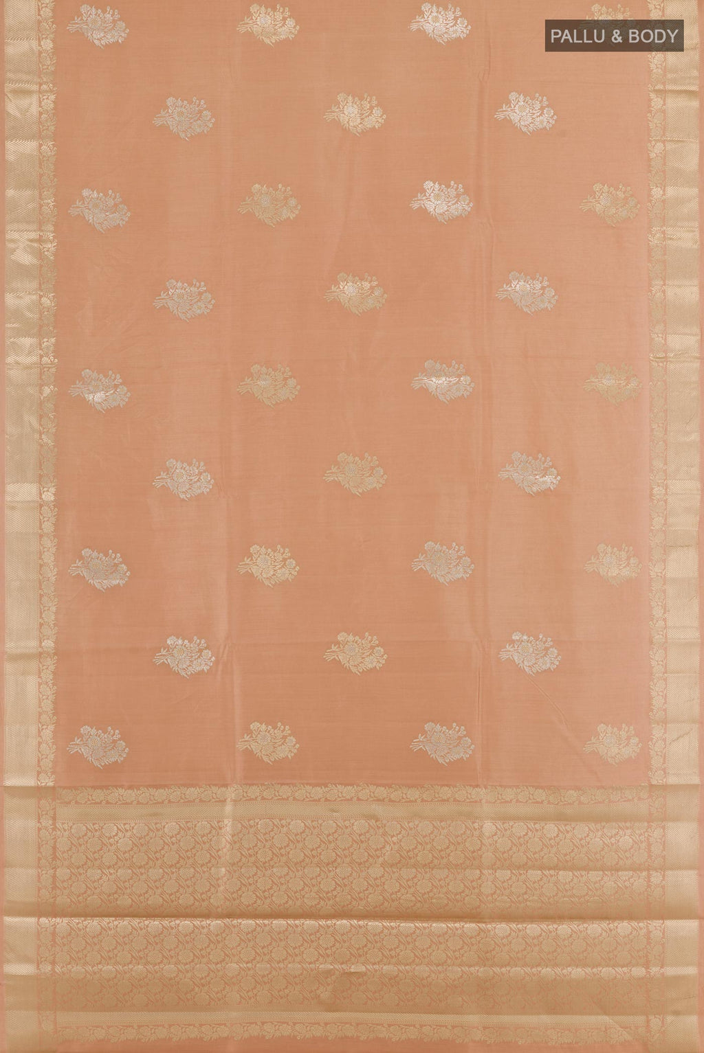 Flat view of Beige Tussar Silk Saree with Zari Butta on the body and Zari Border. 