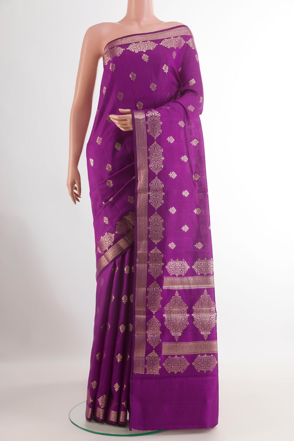 Purple Tussar Silk Saree with Zari Butta on the body and Zari Border.  displayed on a mannequin