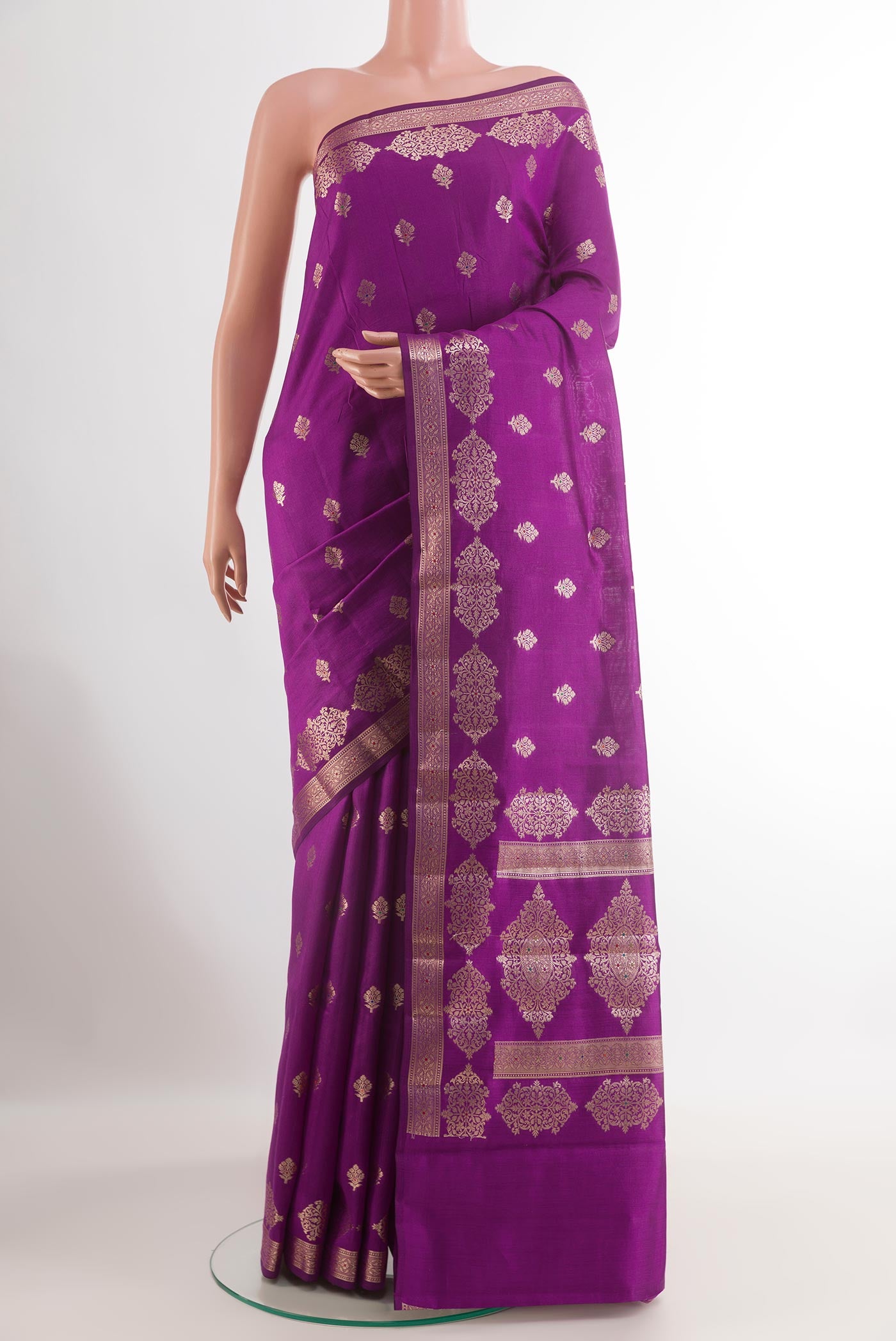 Purple Tussar Silk Saree with Zari Butta on the body and Zari Border.  displayed on a mannequin
