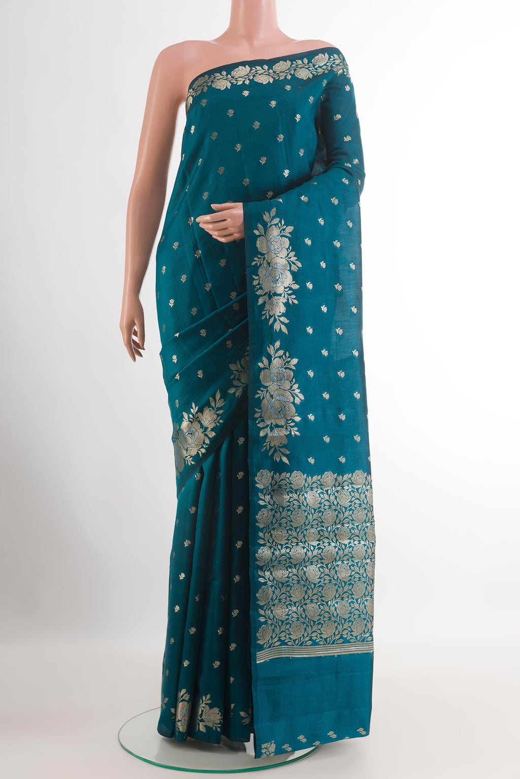 Blue Tussar Silk Saree with Zari Butta on the body and Zari Border.  displayed on a mannequin