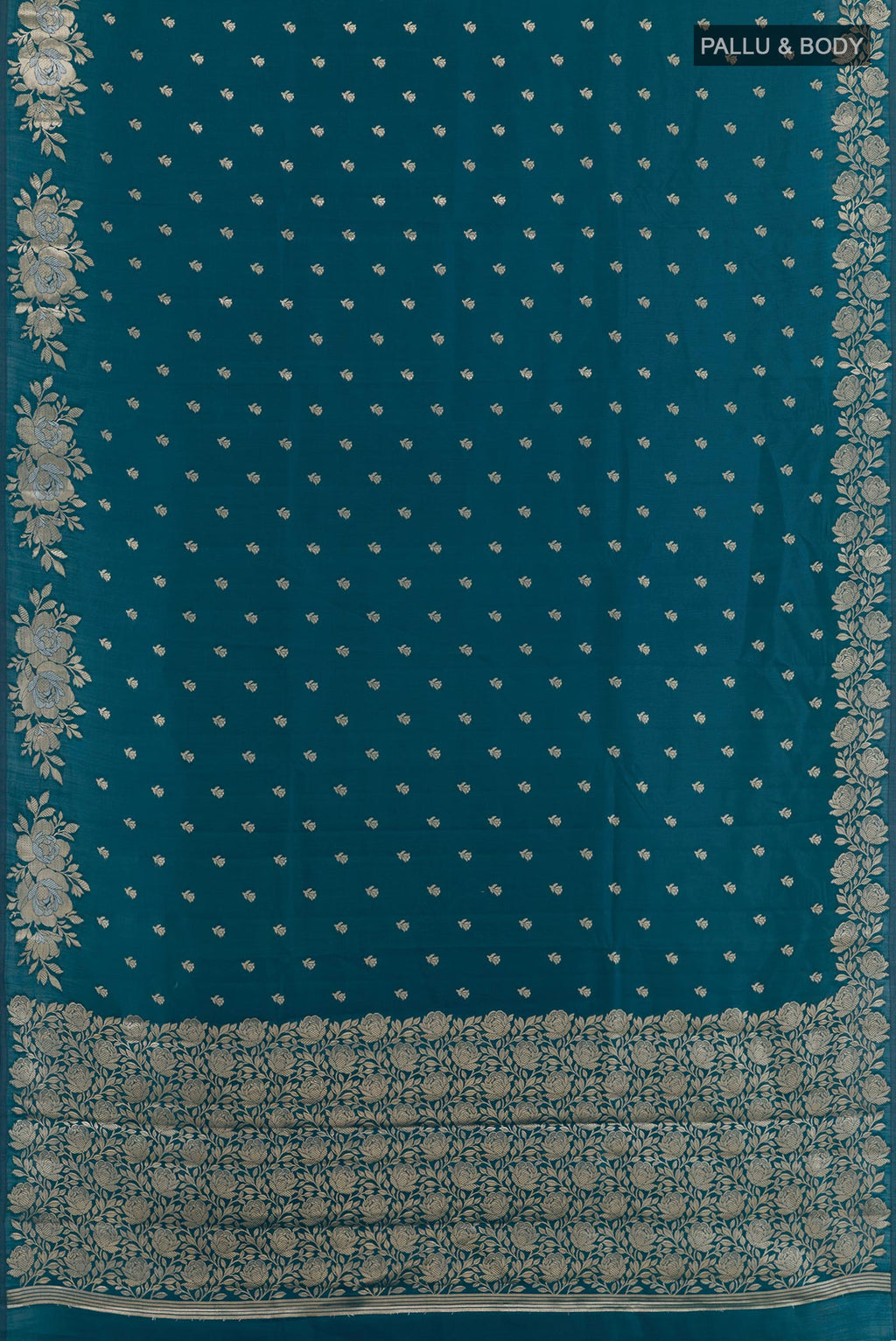 Flat view of Blue Tussar Silk Saree with Zari Butta on the body and Zari Border. 