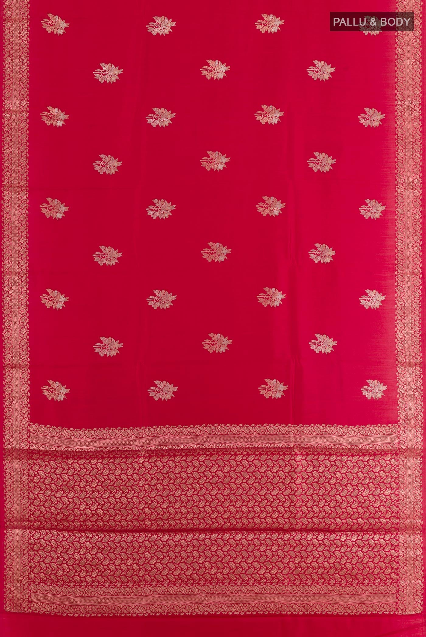 Flat view of Red Tussar Silk Saree with Zari Butta on the body and Zari Border. 