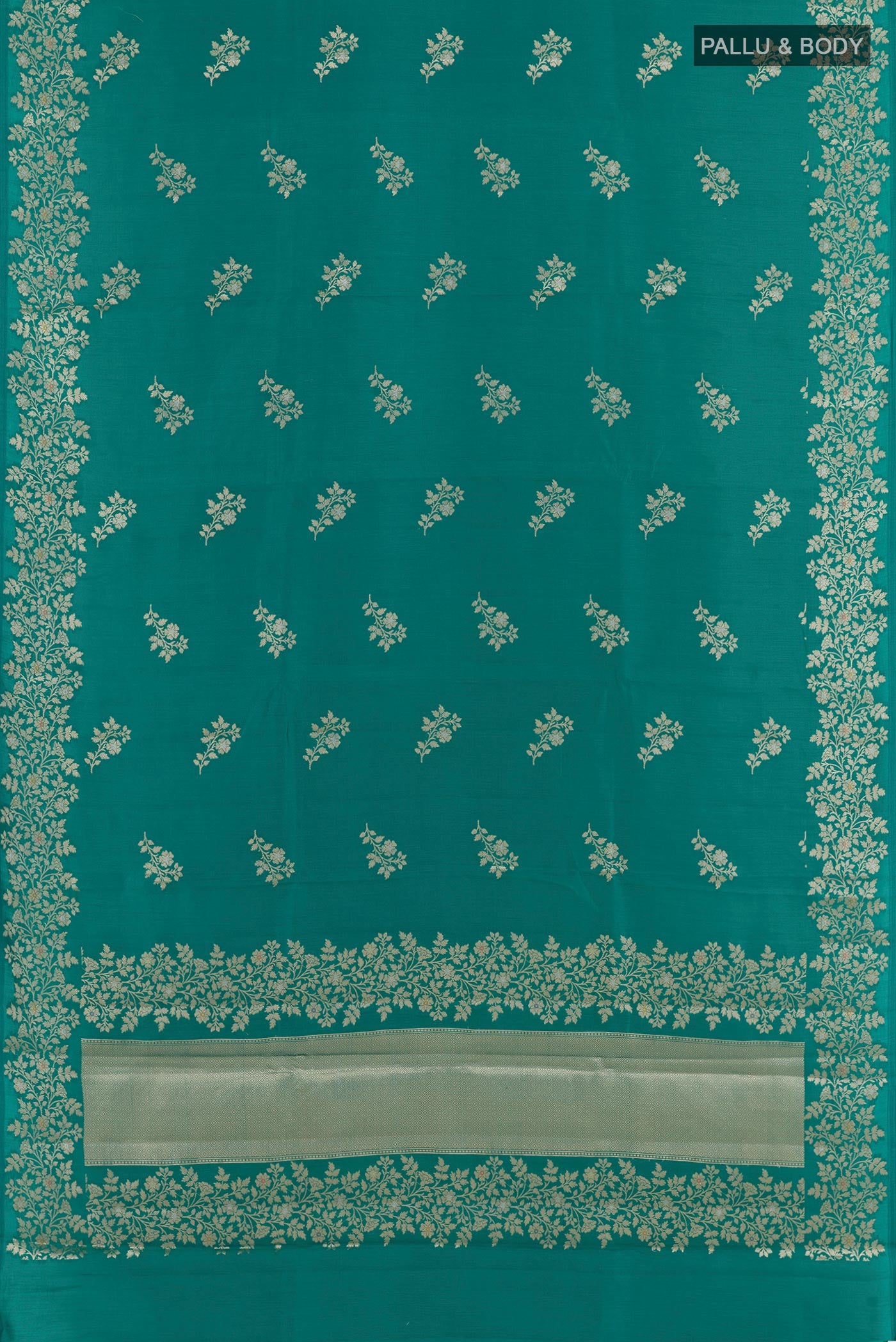 Flat view of Sea Green Tussar Silk Saree with Zari Butta on the body and Zari Border. 