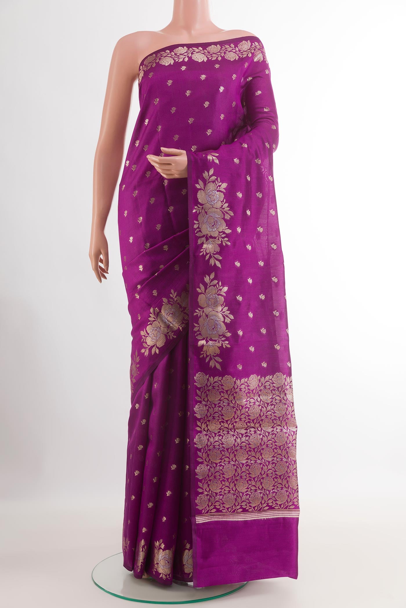 Purple Tussar Silk Saree with Zari Butta on the body and Zari Border.  displayed on a mannequin