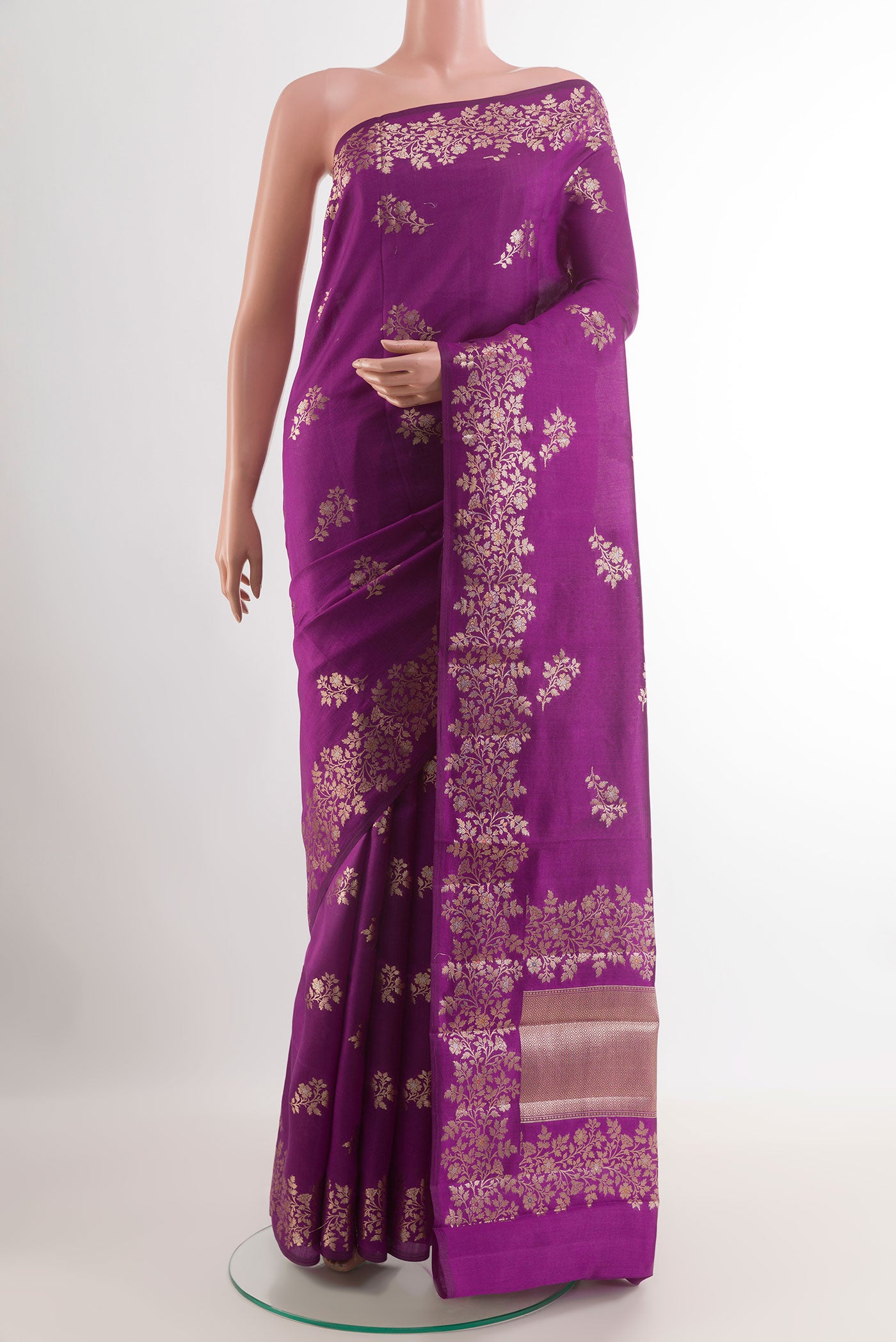 Purple Tussar Silk Saree with Zari Butta on the body and Zari Border.  displayed on a mannequin