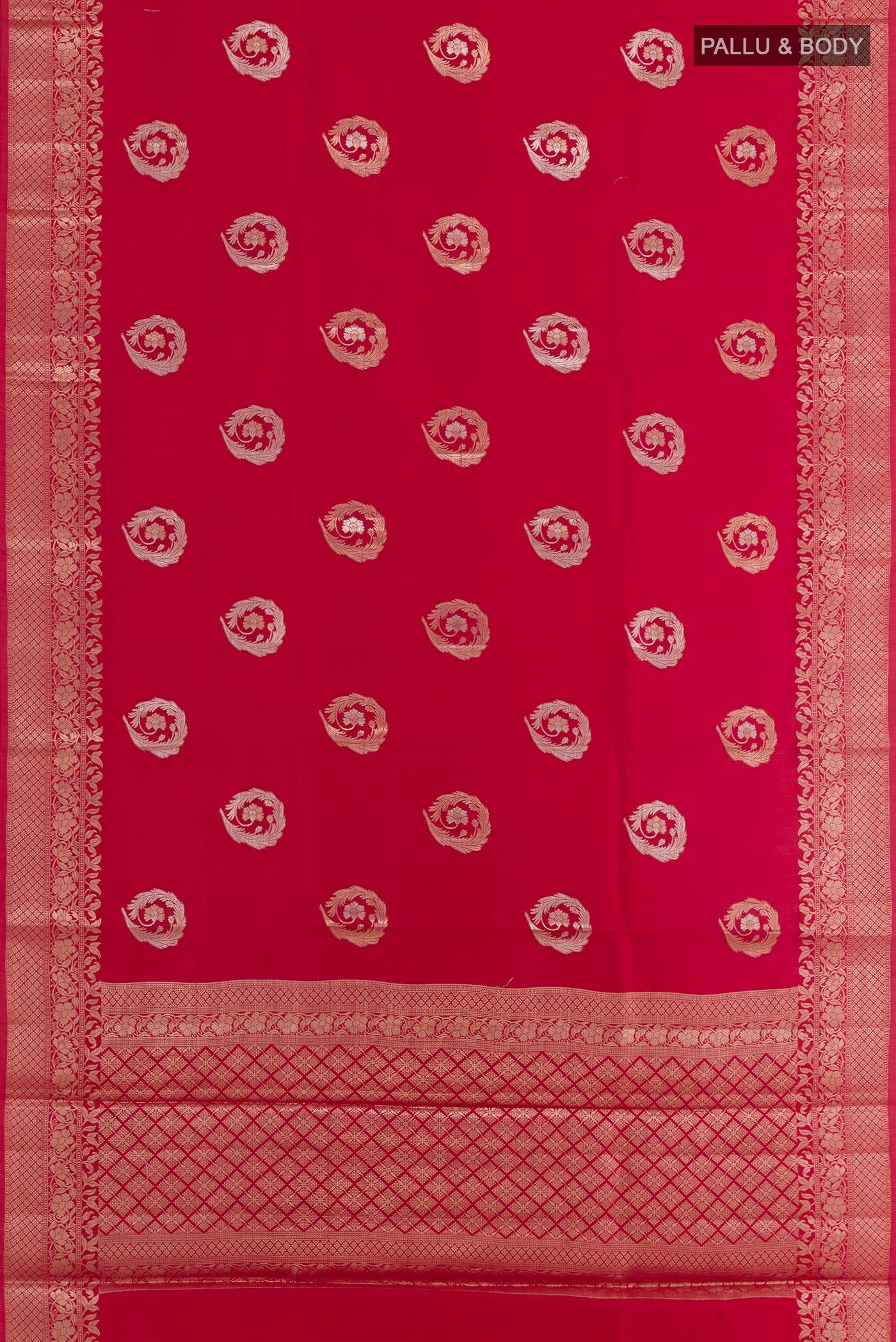 Flat view of Red Tussar Silk Saree with Zari Butta on the body and Zari Border. 