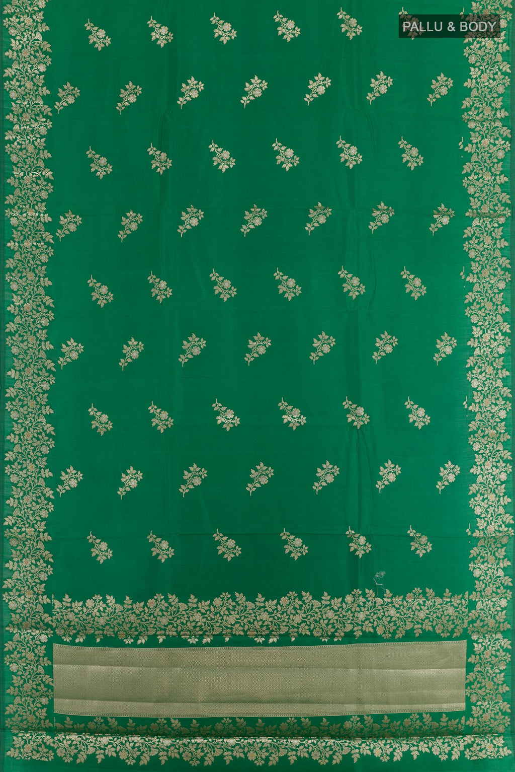Flat view of Green Tussar Silk Saree with Zari Butta on the body and Zari Border. 
