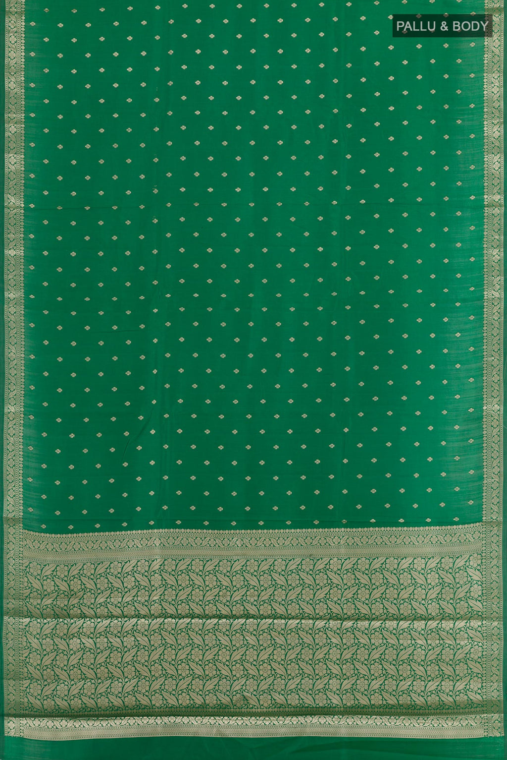 Flat view of Green Tussar Silk Saree with Zari Butta on the body and Zari Border. 
