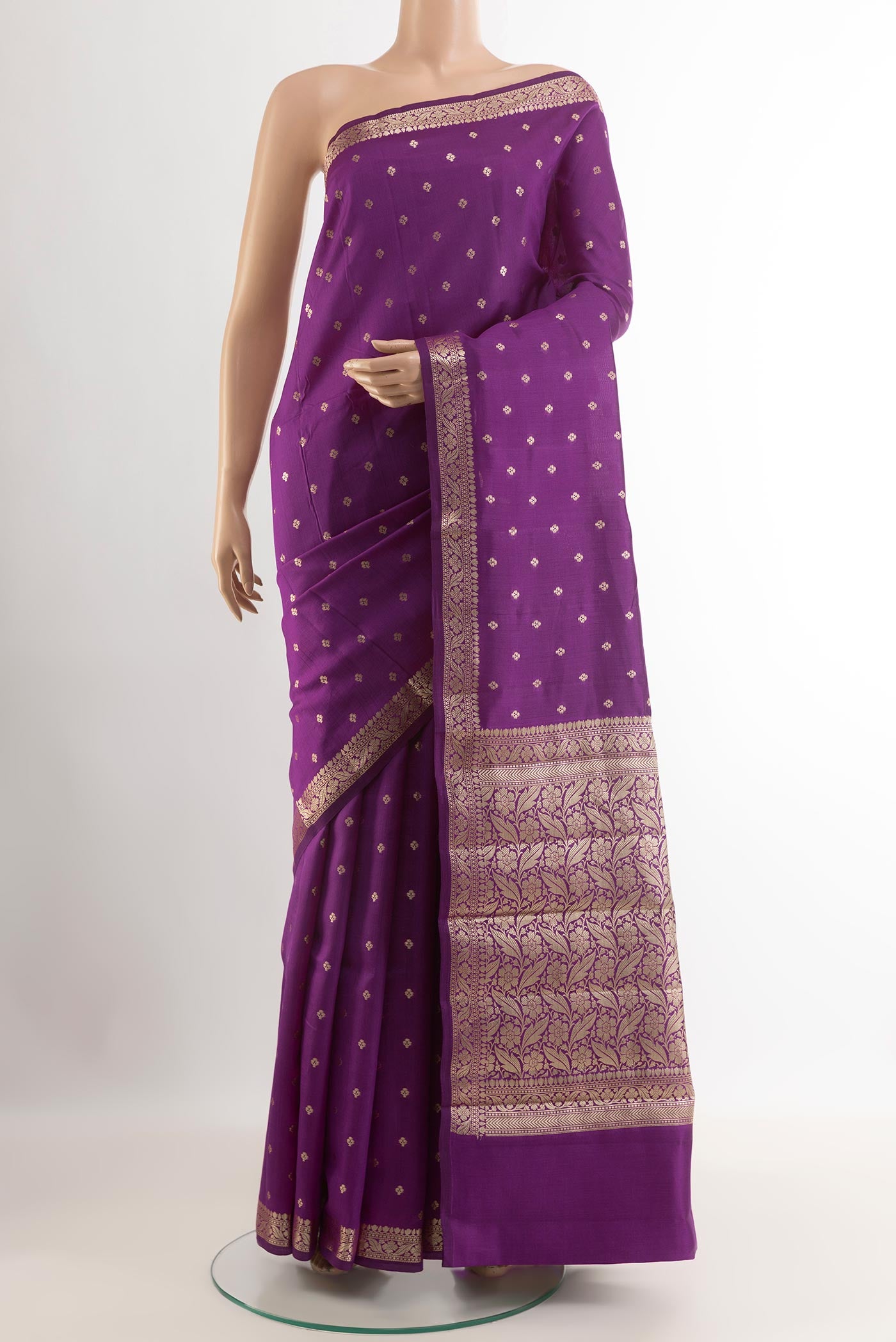 Purple Tussar Silk Saree with Zari Butta on the body and Zari Border.  displayed on a mannequin