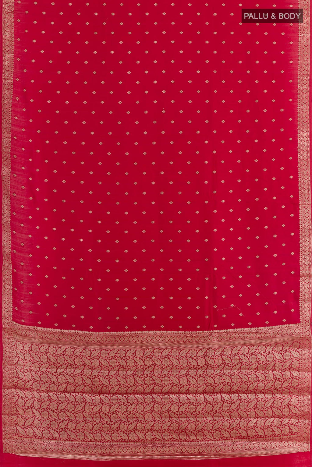 Flat view of Red Tussar Silk Saree with Zari Butta on the body and Zari Border. 