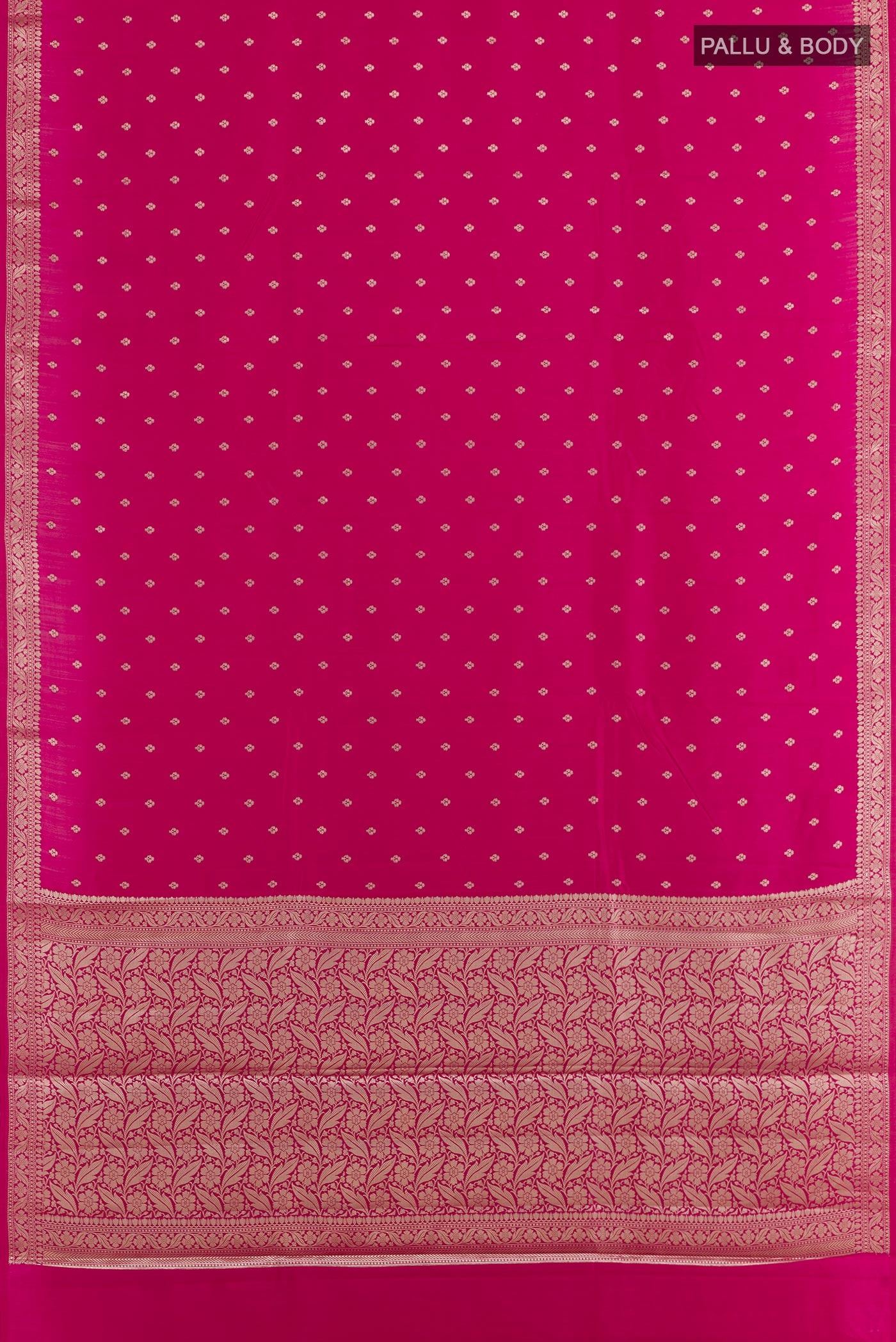 Flat view of Pink Tussar Silk Saree with Zari Butta on the body and Zari Border. 