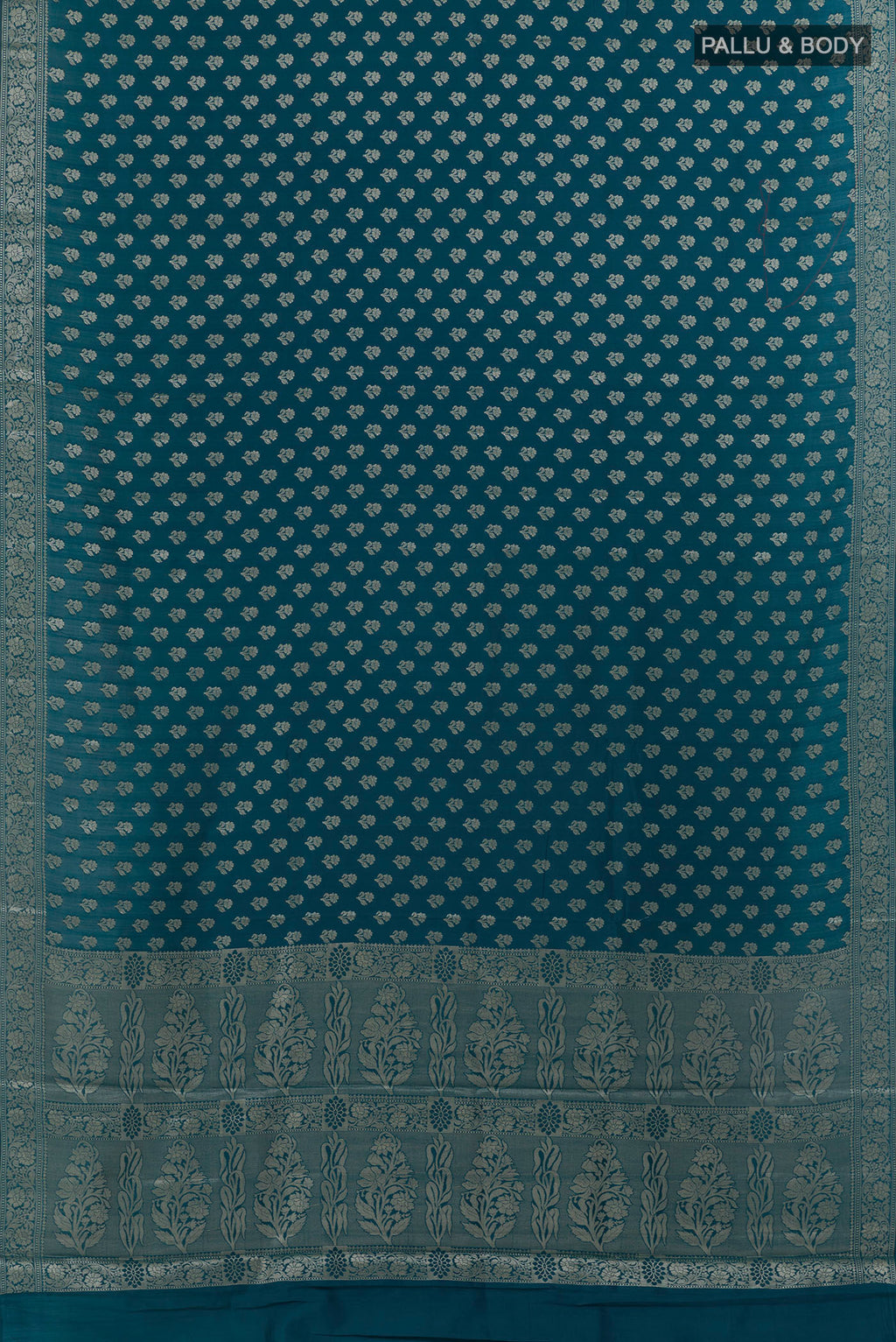 Flat view of Blue Tussar Silk Saree with Zari Butta on the body and Zari Border. 