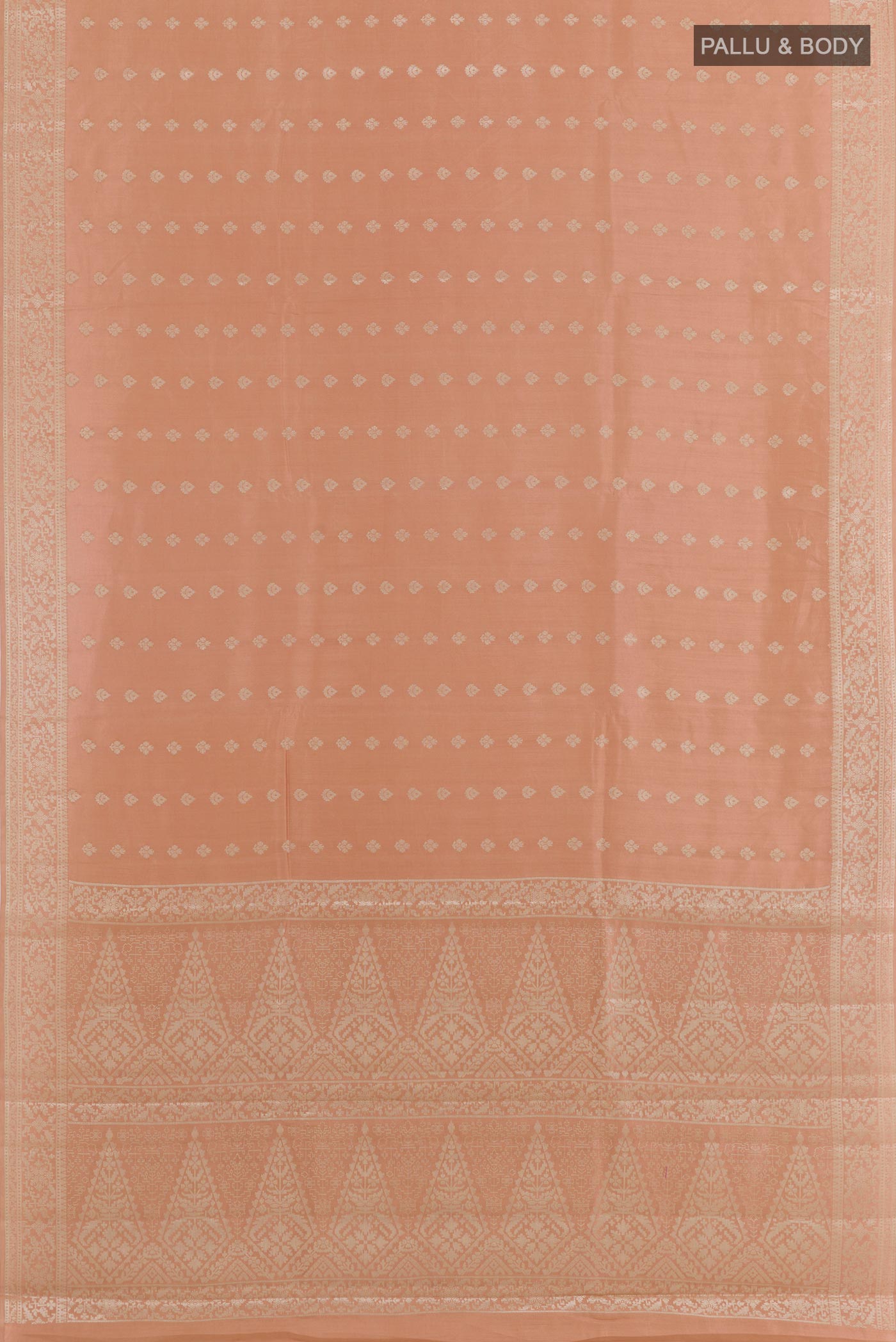 Flat view of Beige Tussar Silk Saree with Zari Butta on the body and Zari Border. 