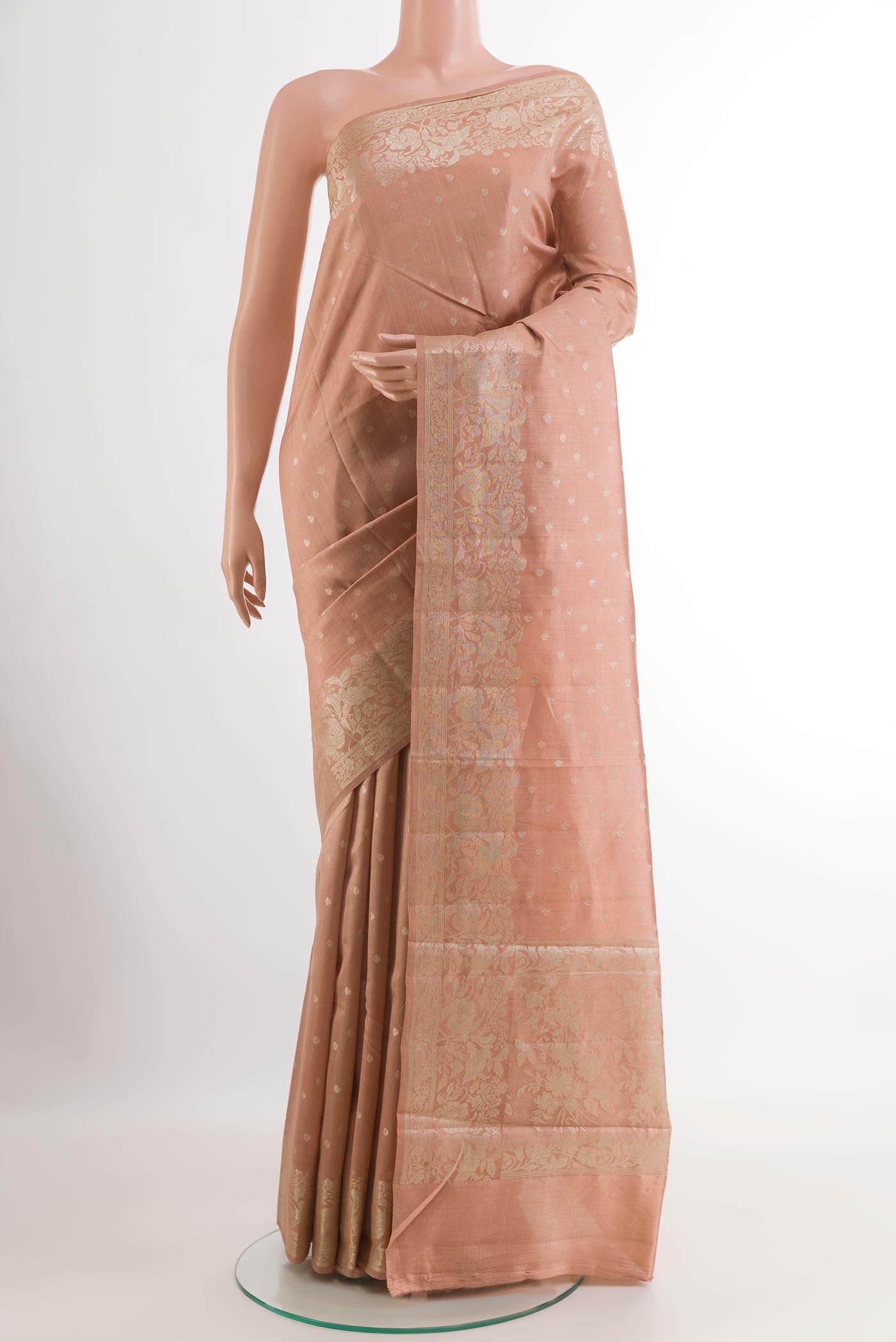 Imperial Pink Tussar Silk Saree with Zari Butta on the body and Zari Border.  displayed on a mannequin