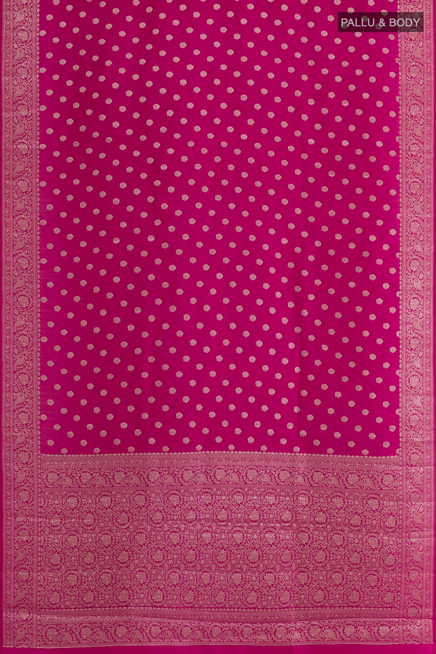 Flat view of Pink Tussar Silk Saree with Zari Butta on the body and Zari Border. 