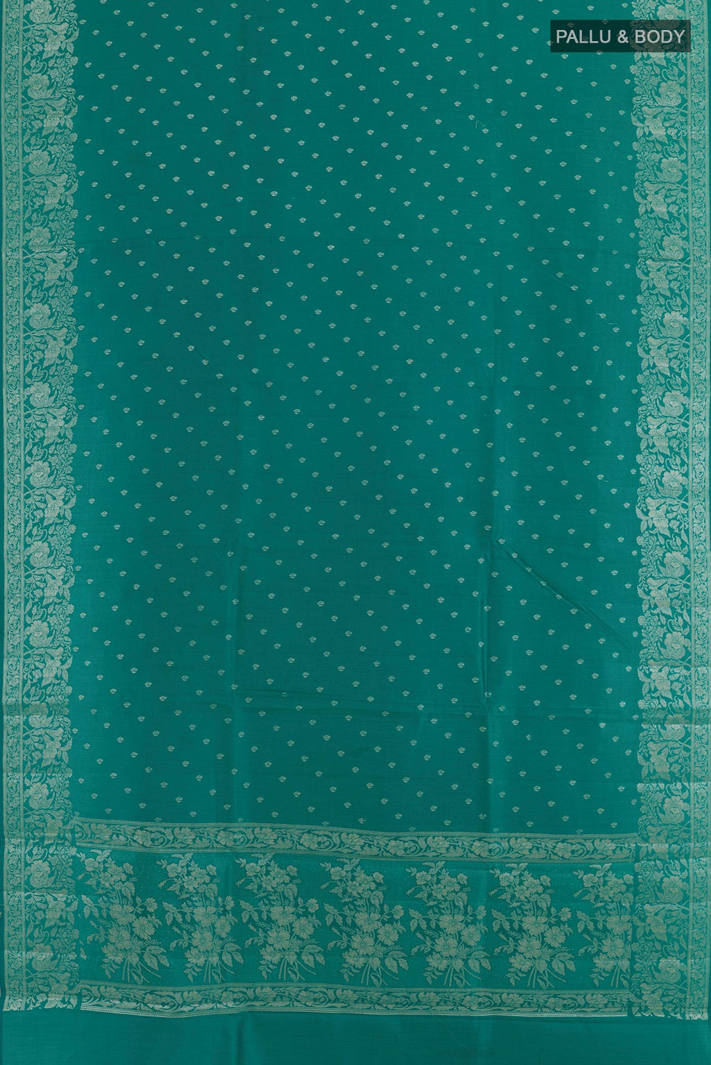Flat view of Sea Green Tussar Silk Saree with Zari Butta on the body and Zari Border. 