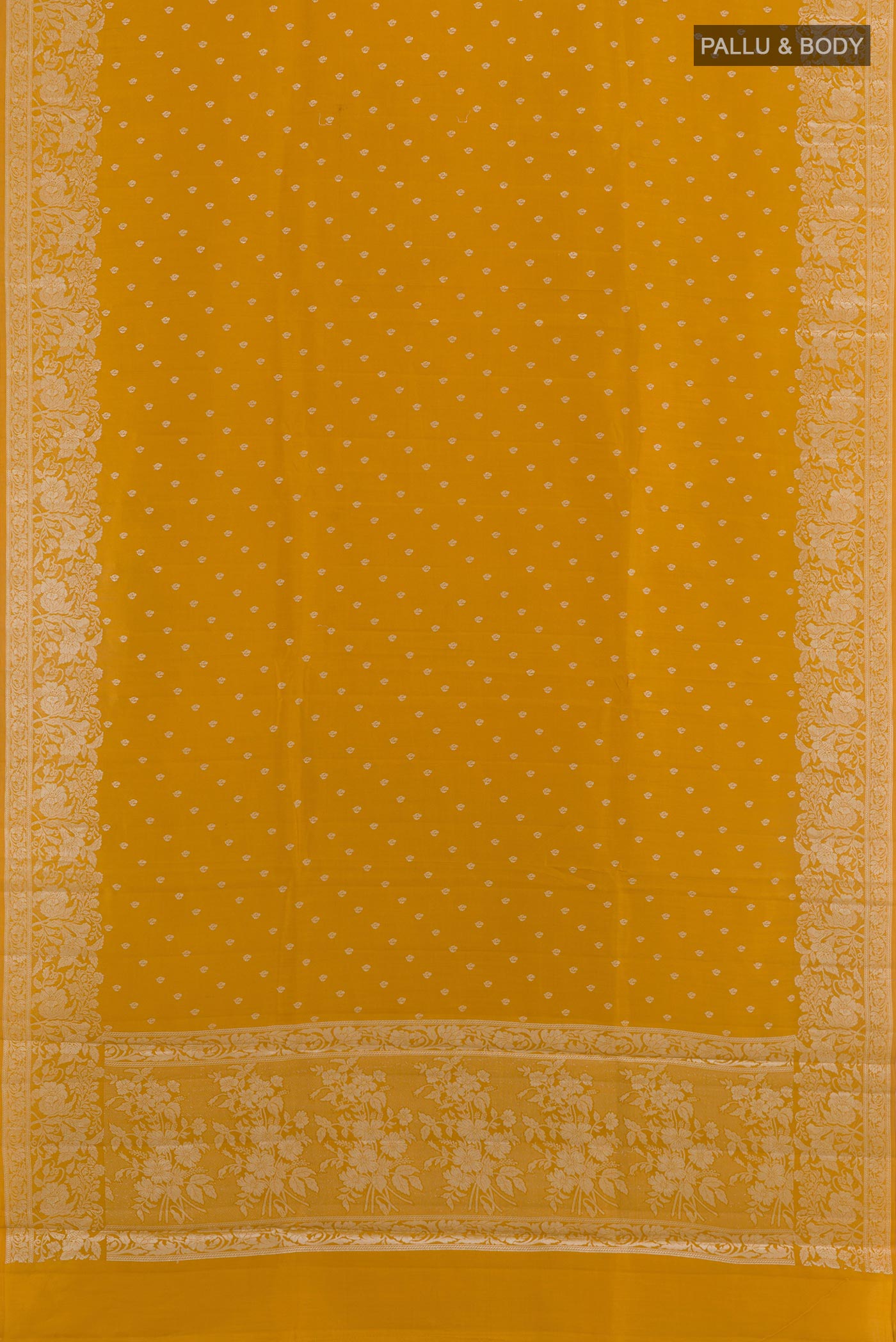 Flat view of Yellow Tussar Silk Saree with Zari Butta on the body and Zari Border. 