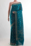 Blue Tussar Silk Saree with Zari Butta on the body and Zari Border.  displayed on a mannequin