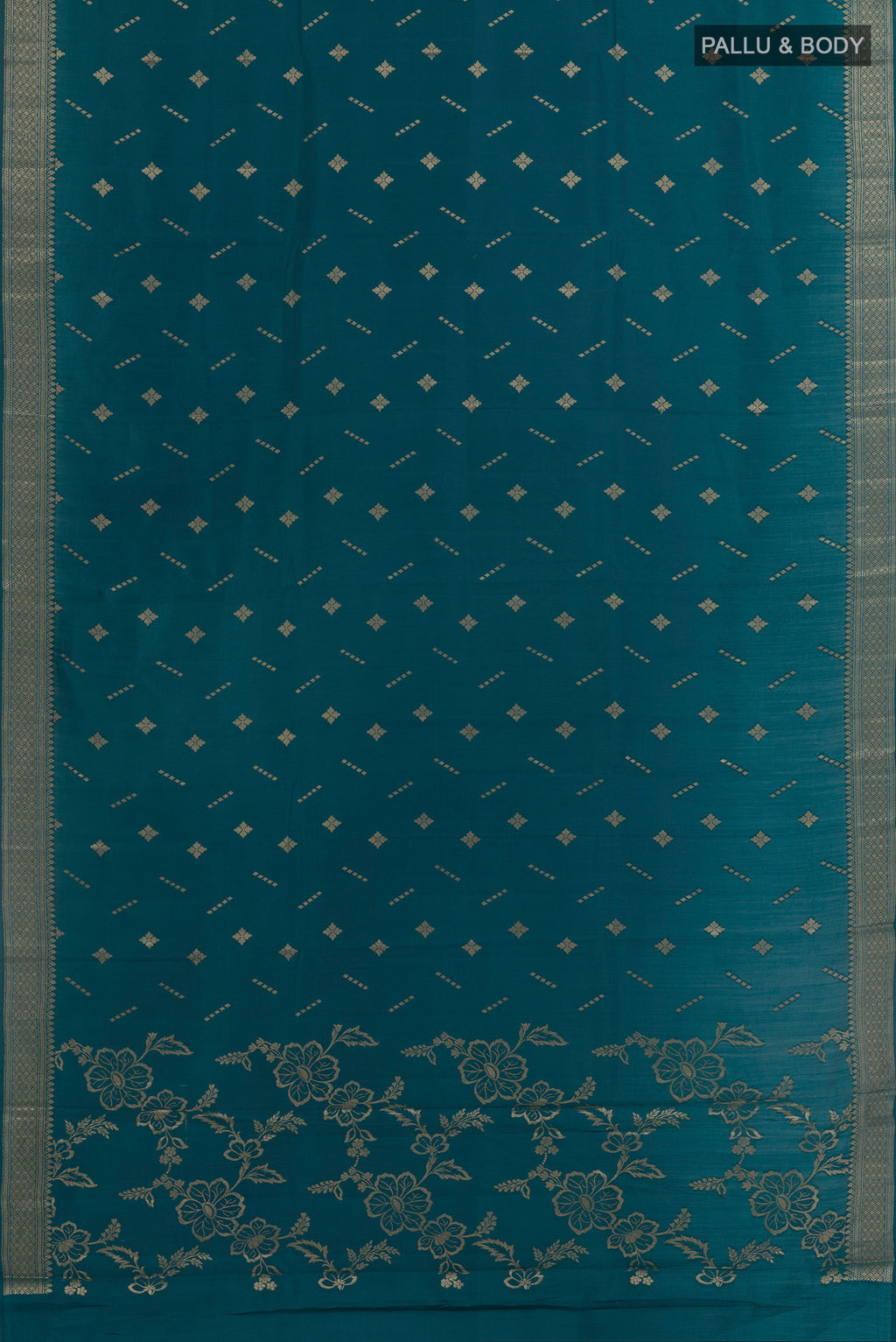 Flat view of Blue Tussar Silk Saree with Zari Butta on the body and Zari Border. 
