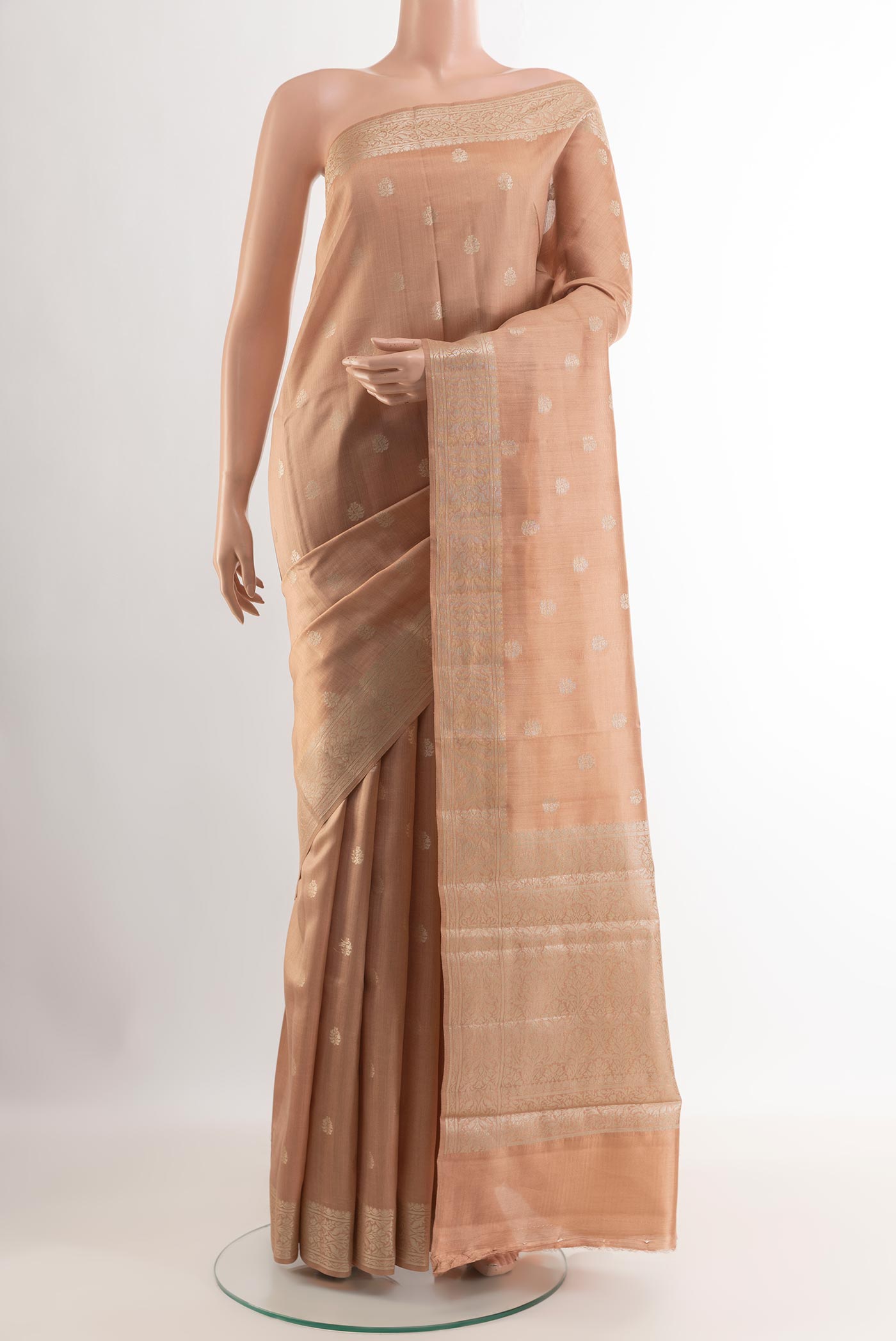 Imperial Pink Tussar Silk Saree with Zari Butta on the body and Zari Border.  displayed on a mannequin