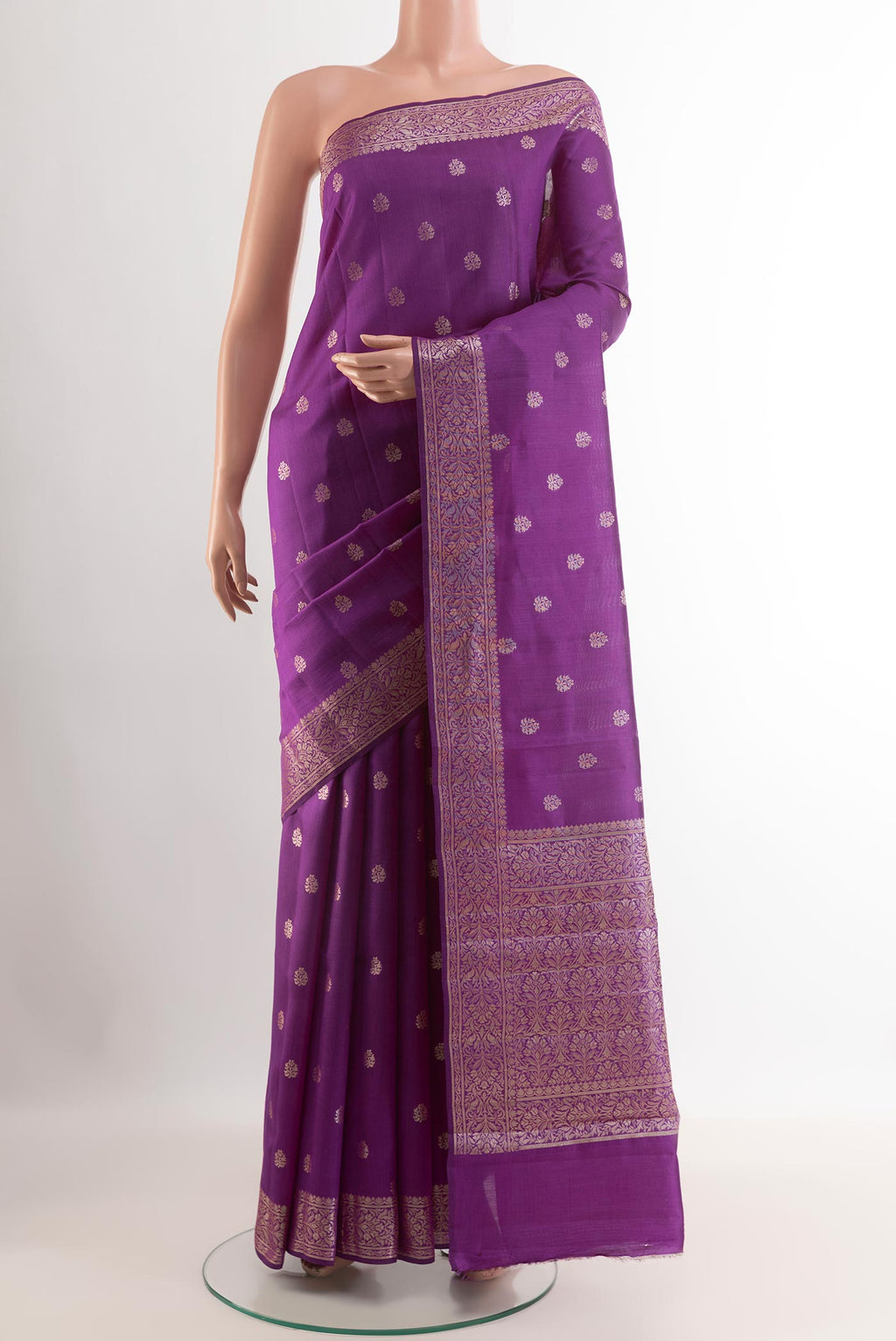 Purple Tussar Silk Saree with Zari Butta on the body and Zari Border.  displayed on a mannequin