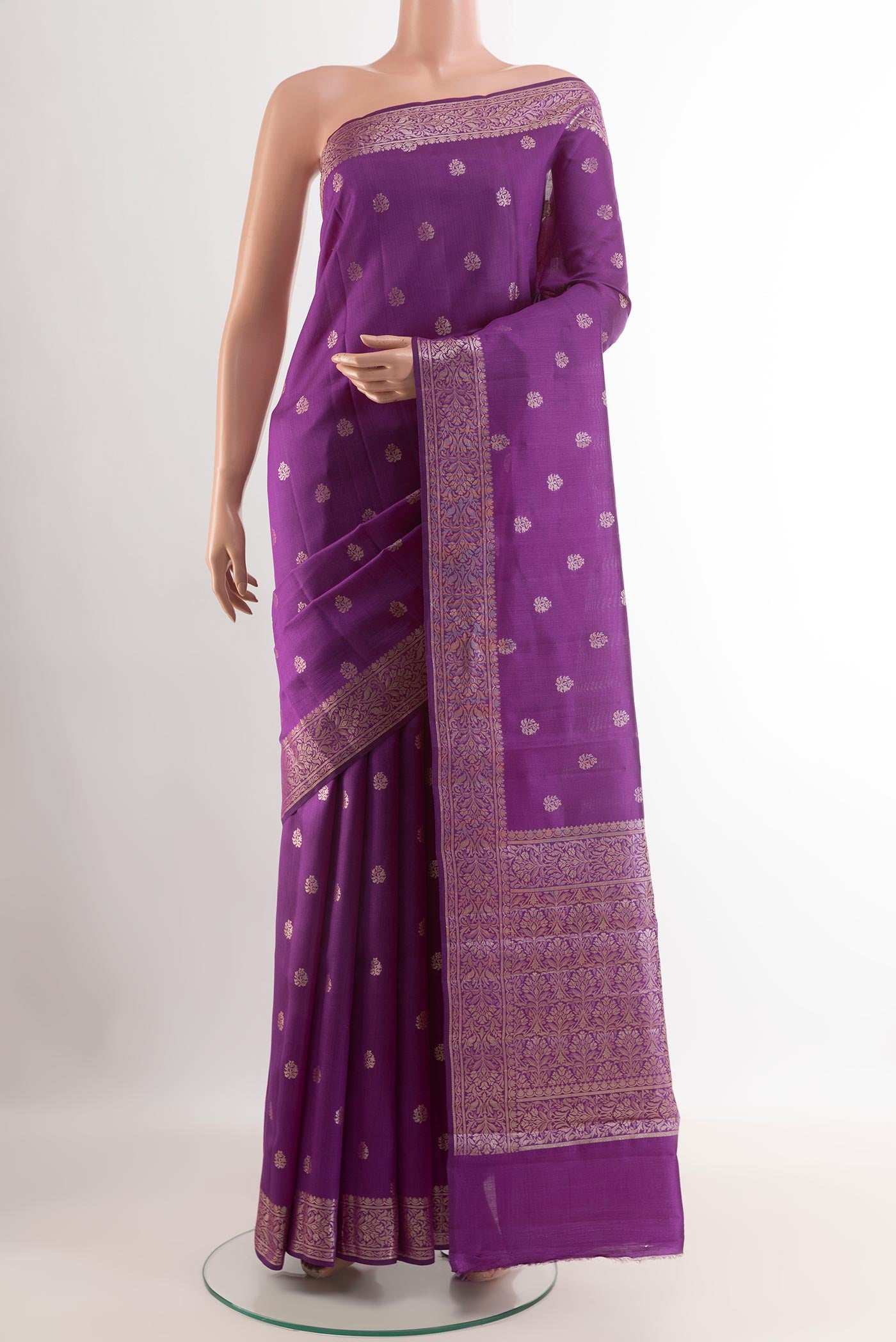 Purple Tussar Silk Saree with Zari Butta on the body and Zari Border.  displayed on a mannequin