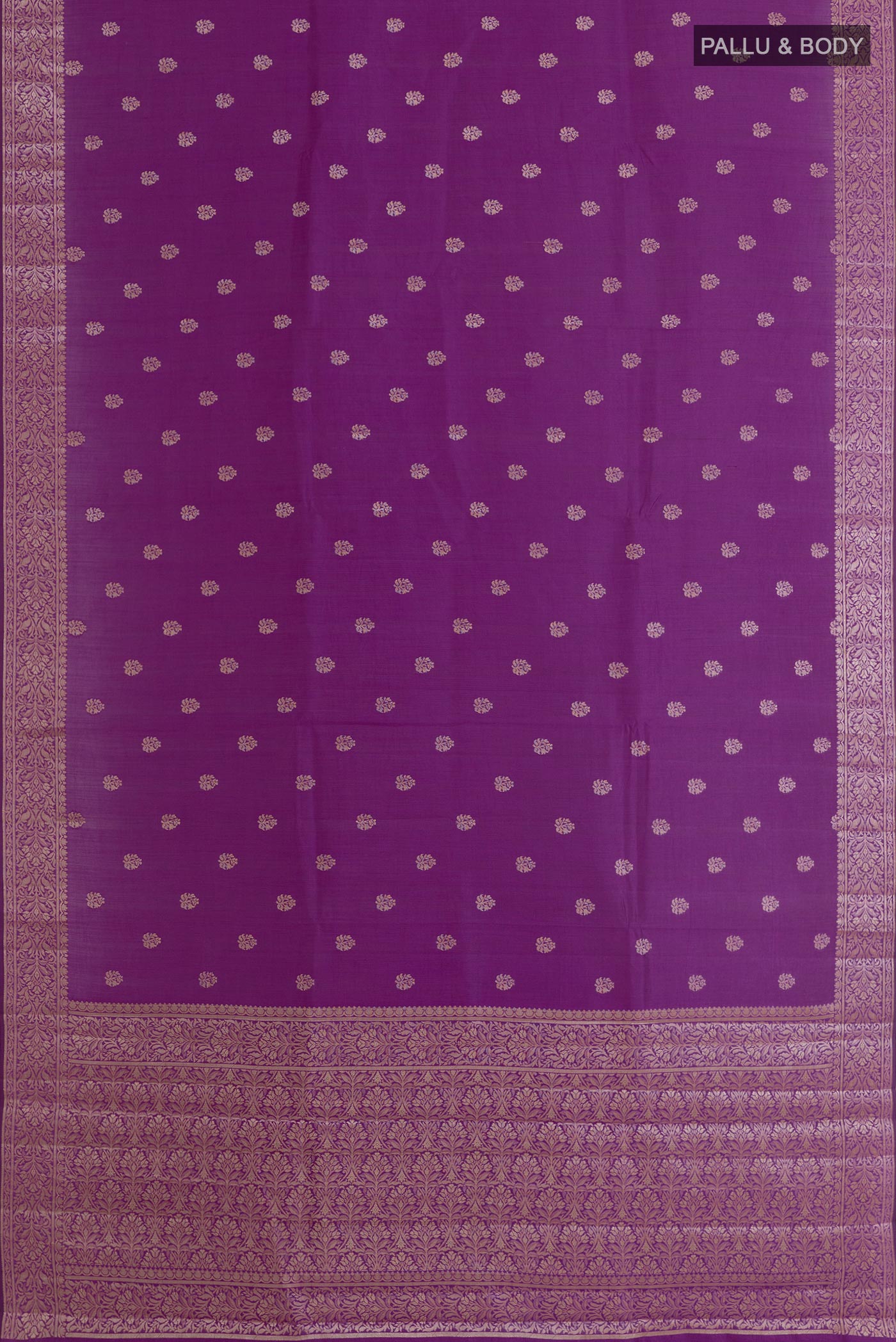 Flat view of Purple Tussar Silk Saree with Zari Butta on the body and Zari Border. 