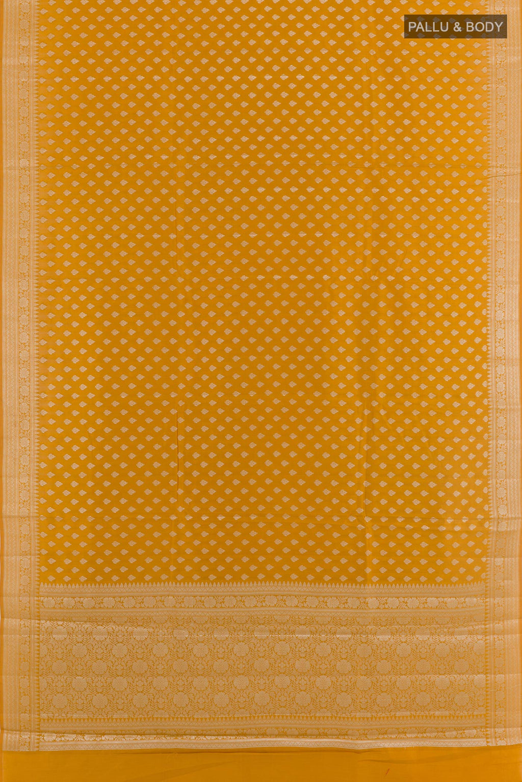Flat view of Yellow Tussar Silk Saree with Zari Butta on the body and Zari Border. 