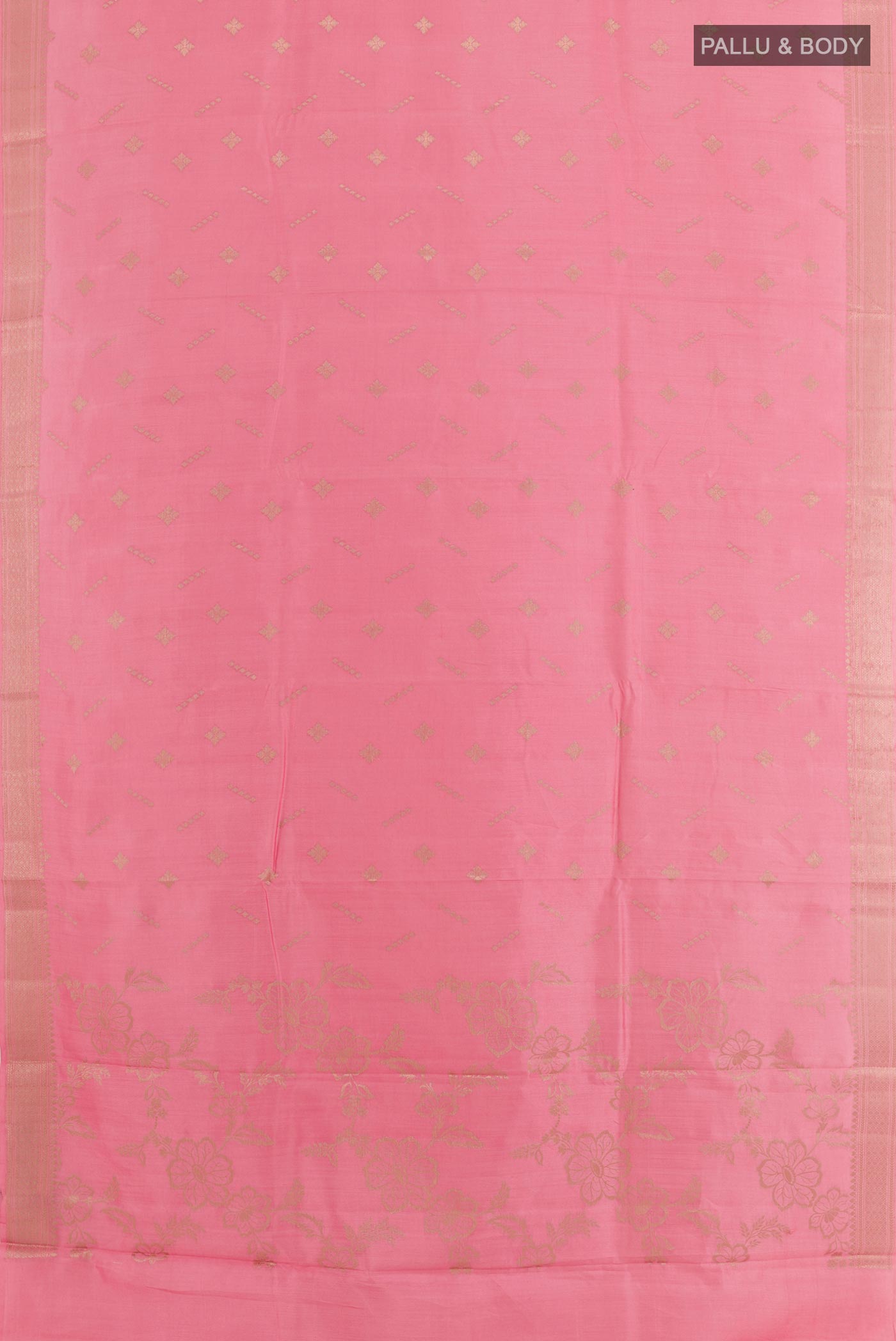 Flat view of Pink Tussar Silk Saree with Zari Butta on the body and Zari Border. 