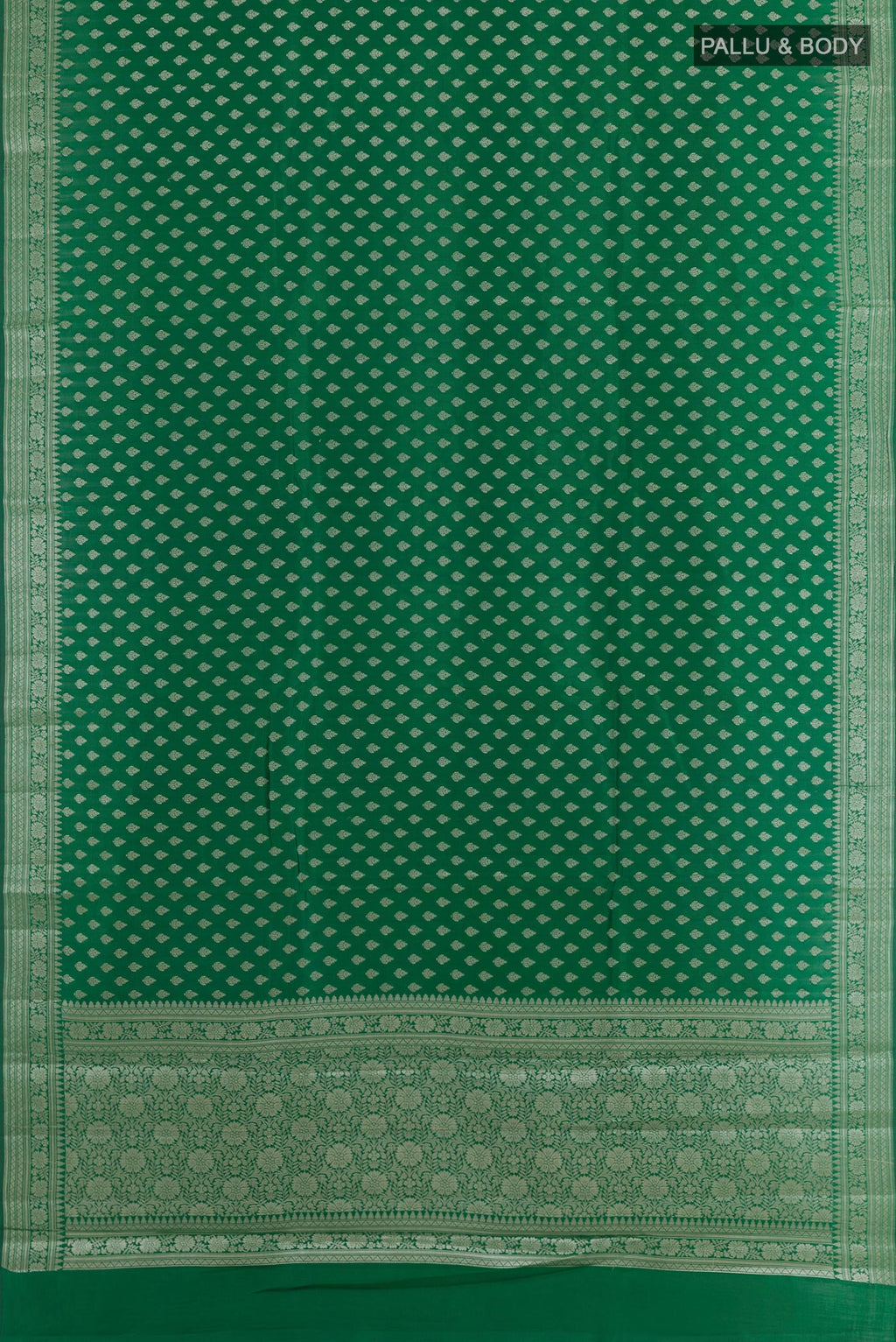Flat view of Green Tussar Silk Saree with Zari Butta on the body and Zari Border. 