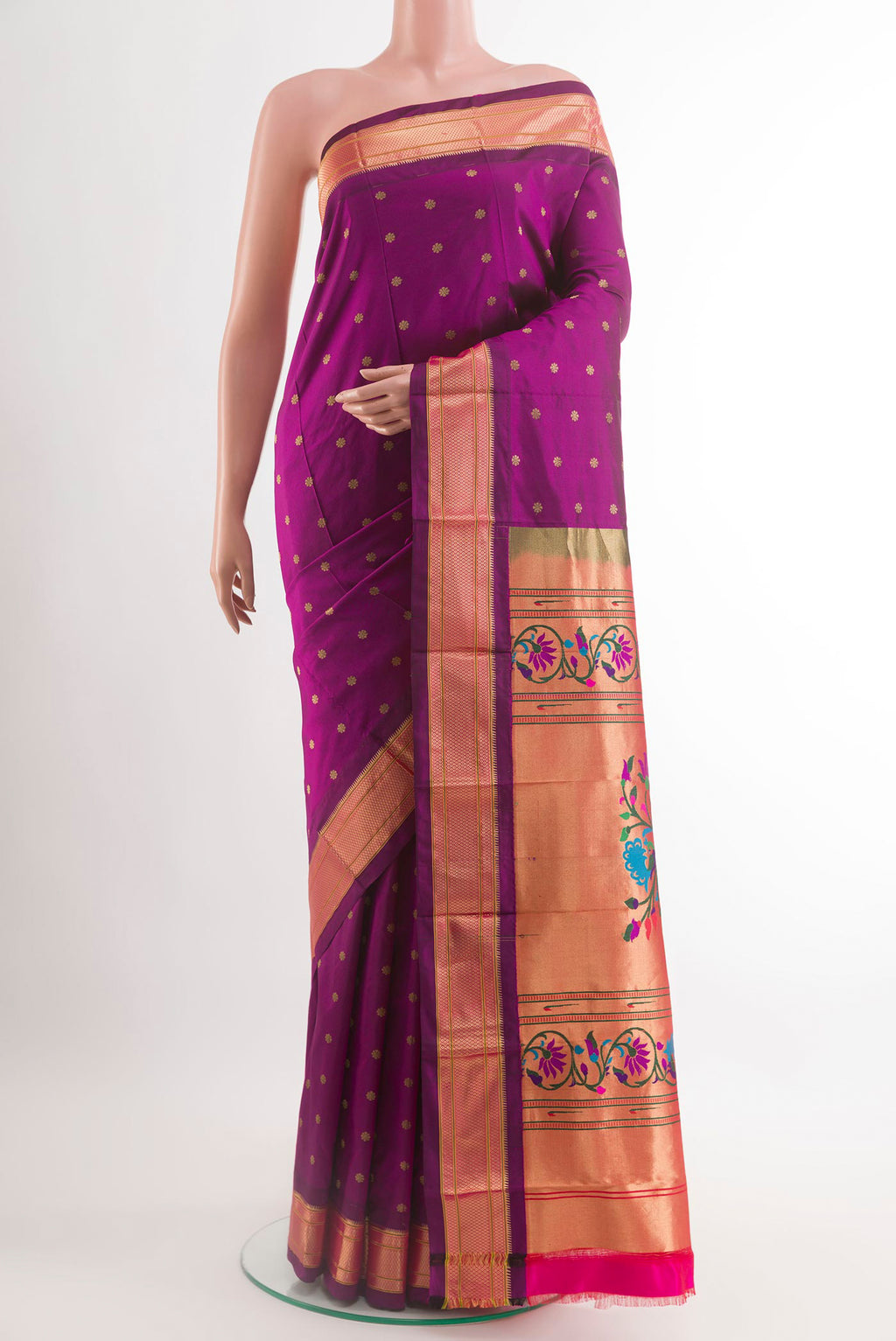 Purple Paithani Silk Saree with Zari Butta on the body and Zari Border.  displayed on a mannequin