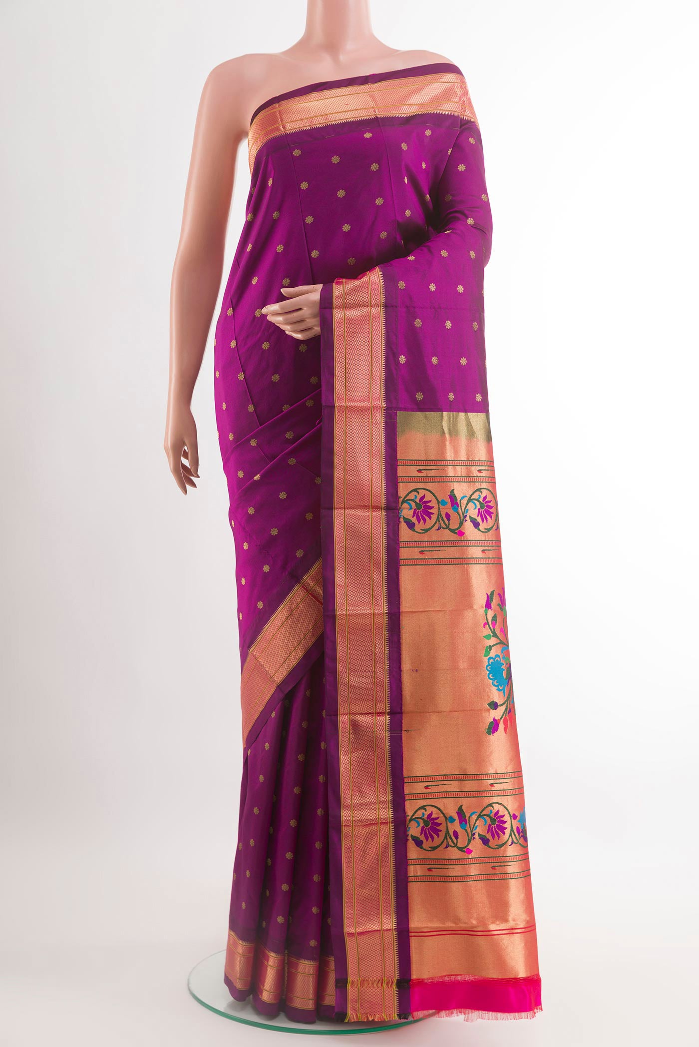 Purple Paithani Silk Saree with Zari Butta on the body and Zari Border.  displayed on a mannequin