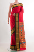 Red Gadwal Silk Saree with Zari Butta on the body and Zari Border.  displayed on a mannequin