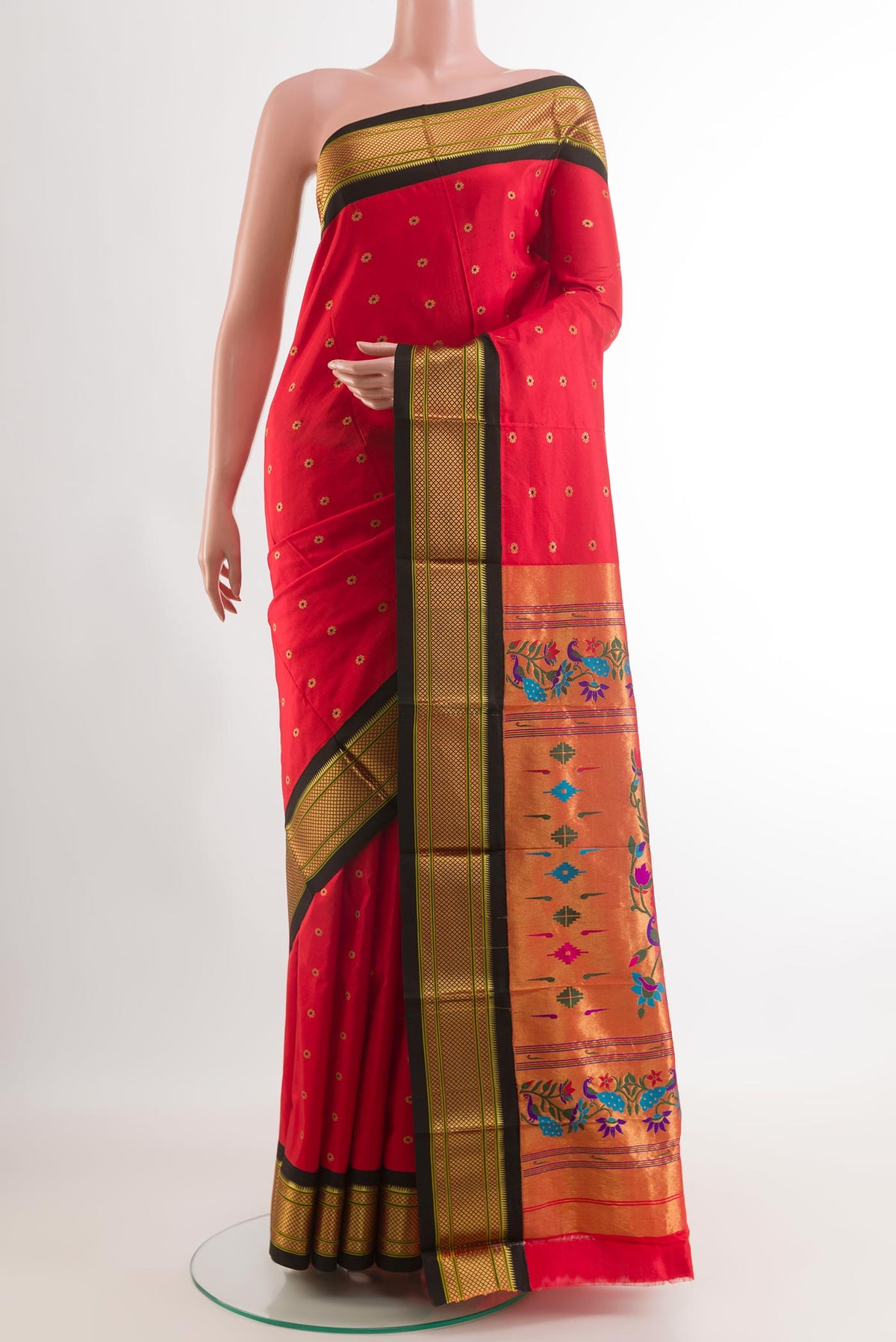 Red Gadwal Silk Saree with Zari Butta on the body and Zari Border.  displayed on a mannequin