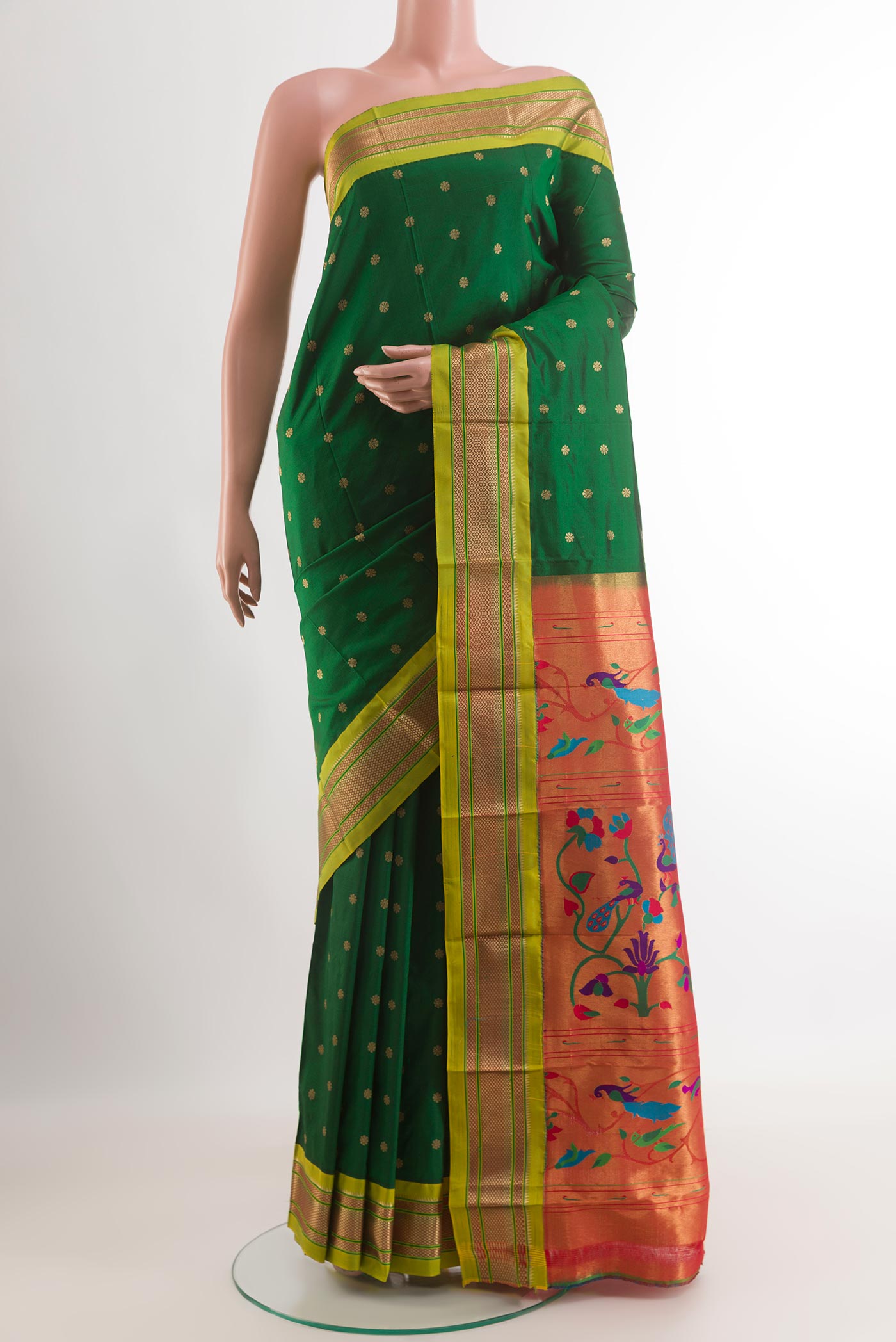 Green Gadwal Silk Saree with Zari Butta on the body and Zari Border.  displayed on a mannequin