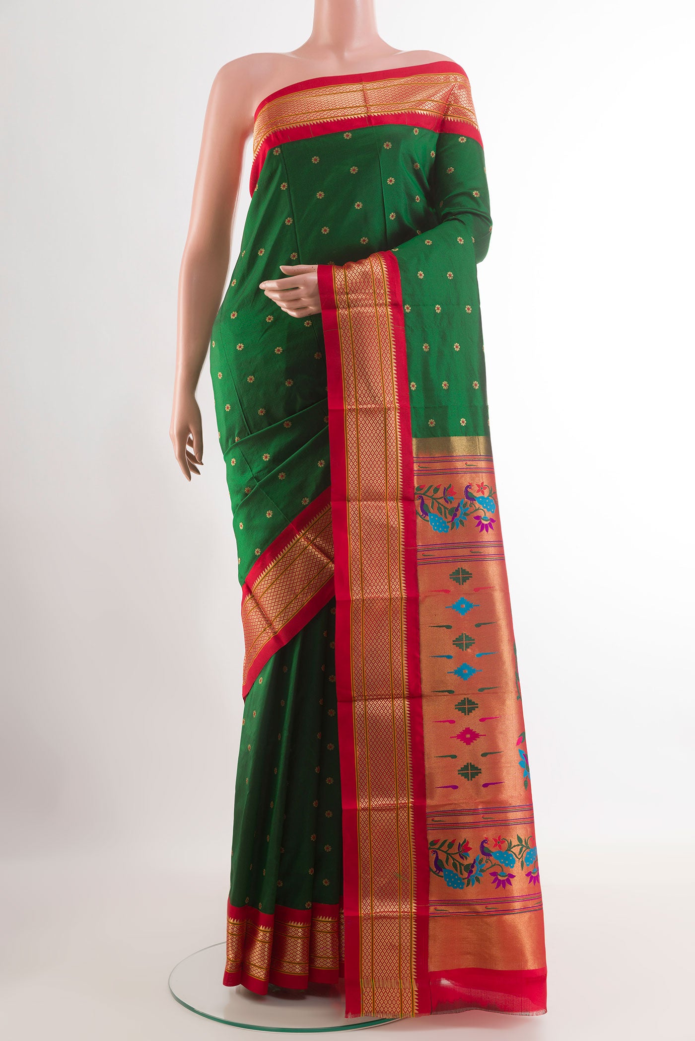 Green Gadwal Silk Saree with Zari Butta on the body and Zari Border.  displayed on a mannequin