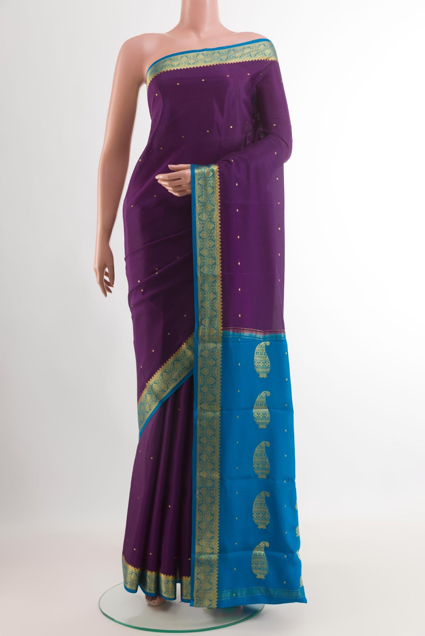 Purple Mysore Silk Saree with Zari Butta on the body and Zari Border.  displayed on a mannequin
