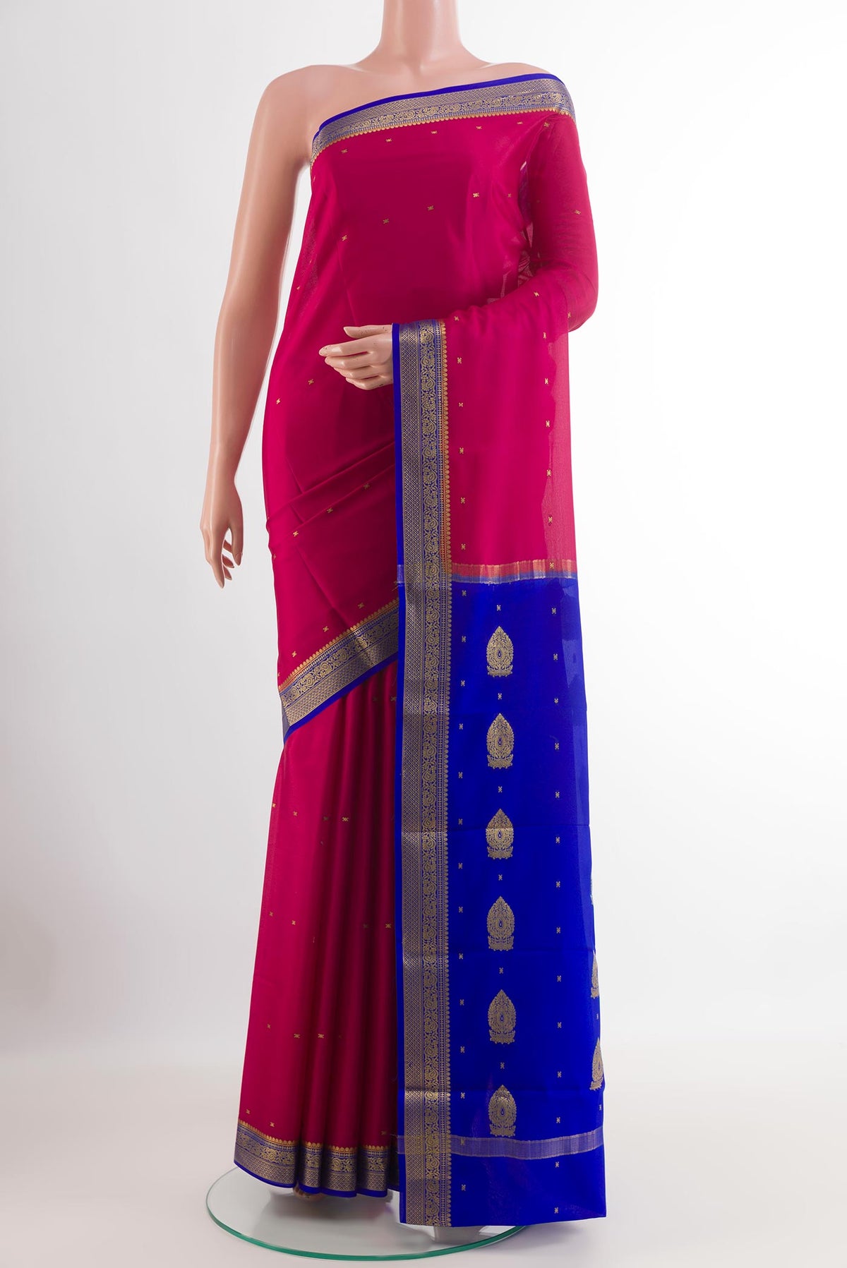 Pink Mysore Silk Saree with Zari Butta on the body and Zari Border.  displayed on a mannequin