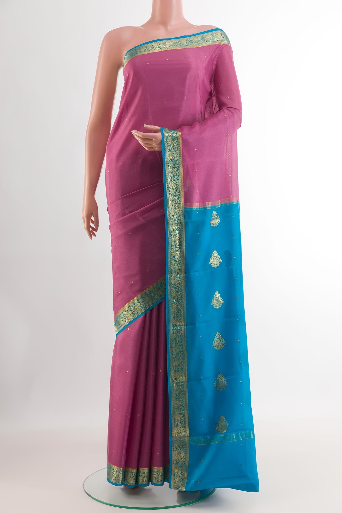 Pink Mysore Silk Saree with Zari Butta on the body and Zari Border.  displayed on a mannequin