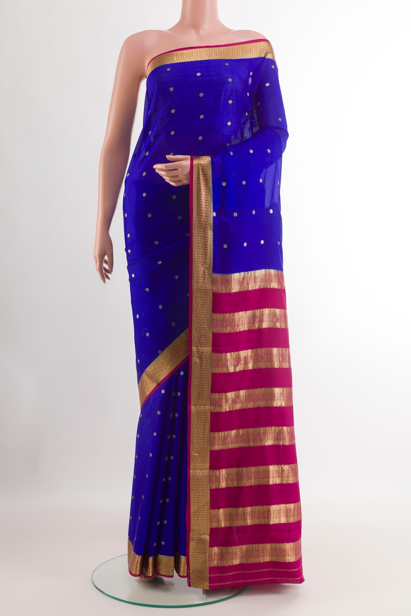 Blue Mysore Silk Saree with Zari Butta on the body and Zari Border.  displayed on a mannequin