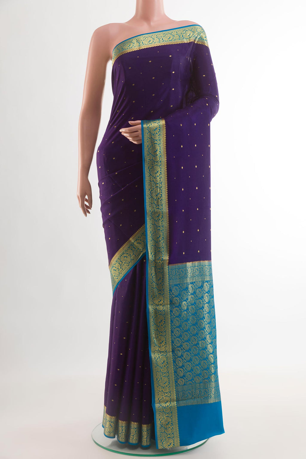 Navy Blue Mysore Chiffon Saree with Zari Butta on the body and Zari Border.  displayed on a mannequin