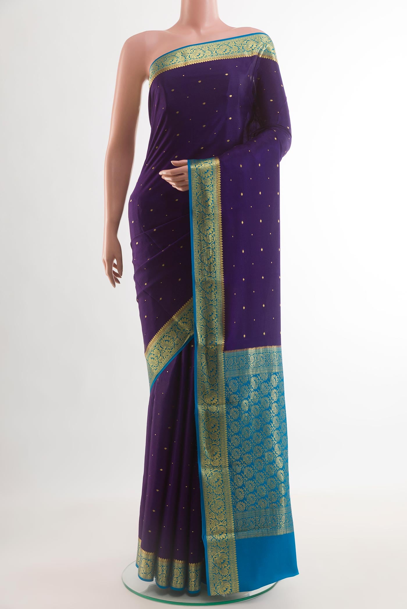 Navy Blue Mysore Chiffon Saree with Zari Butta on the body and Zari Border.  displayed on a mannequin