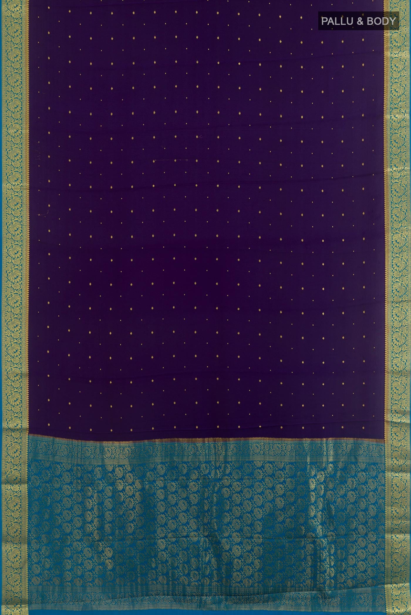 Flat view of Navy Blue Mysore Chiffon Saree with Zari Butta on the body and Zari Border. 