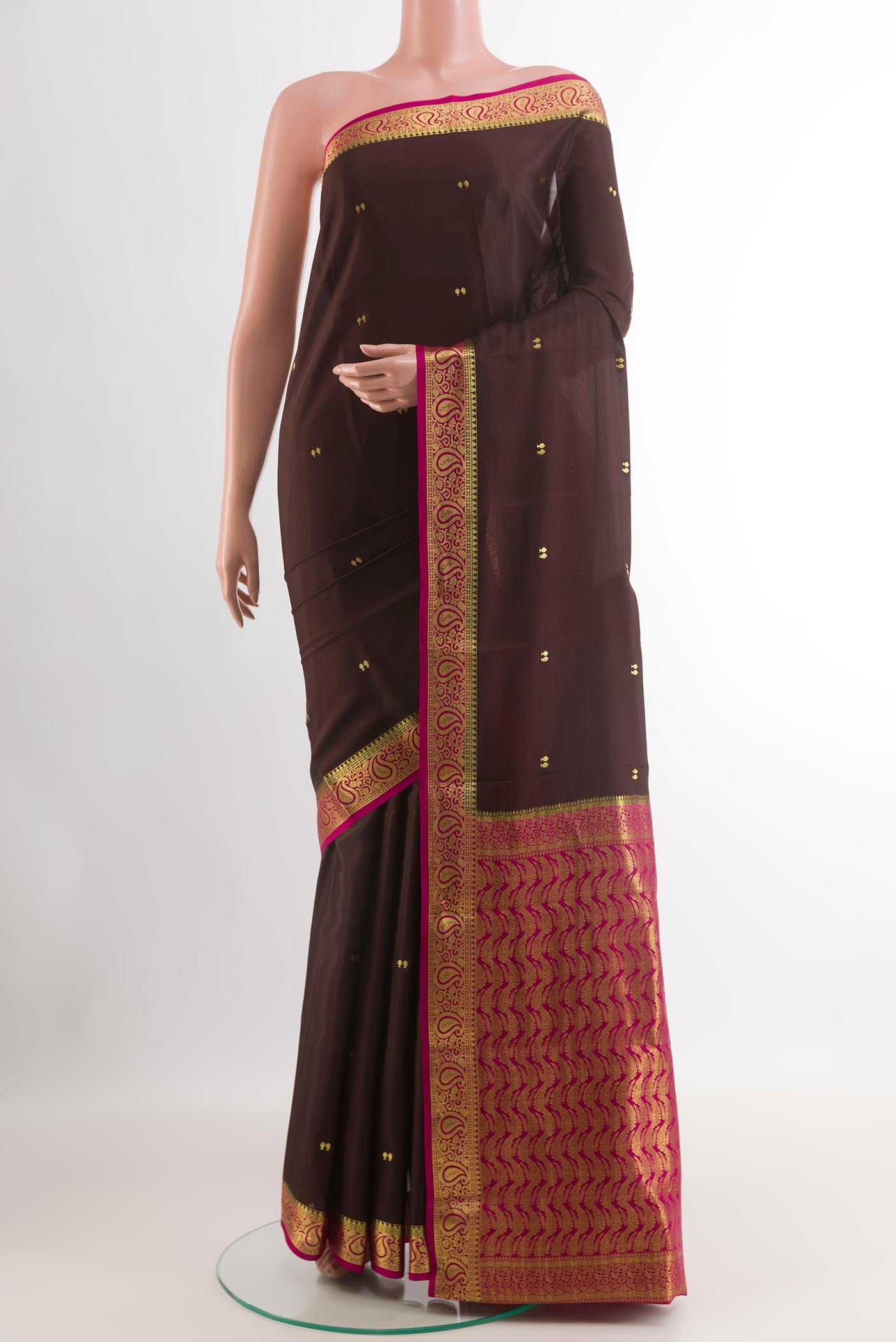 Brown Mysore Silk Saree with Zari Butta on the body and Zari Border.  displayed on a mannequin