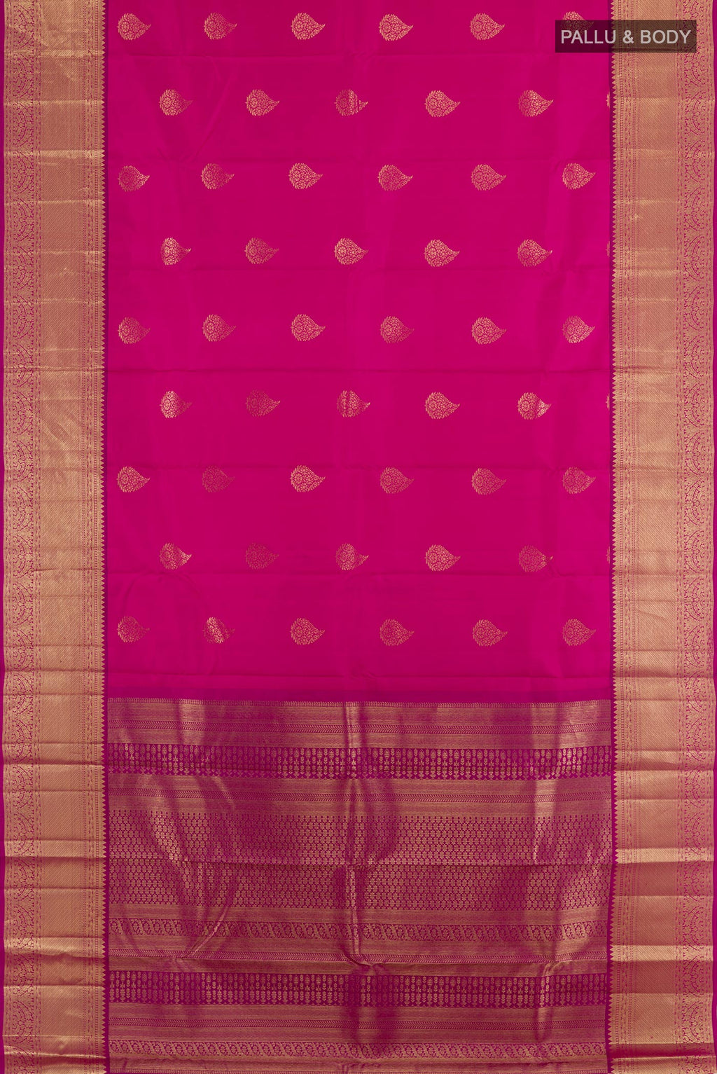 Flat view of Rani Pink Kanchipuram Silk Saree with Zari Butta on the body and Zari Border. 