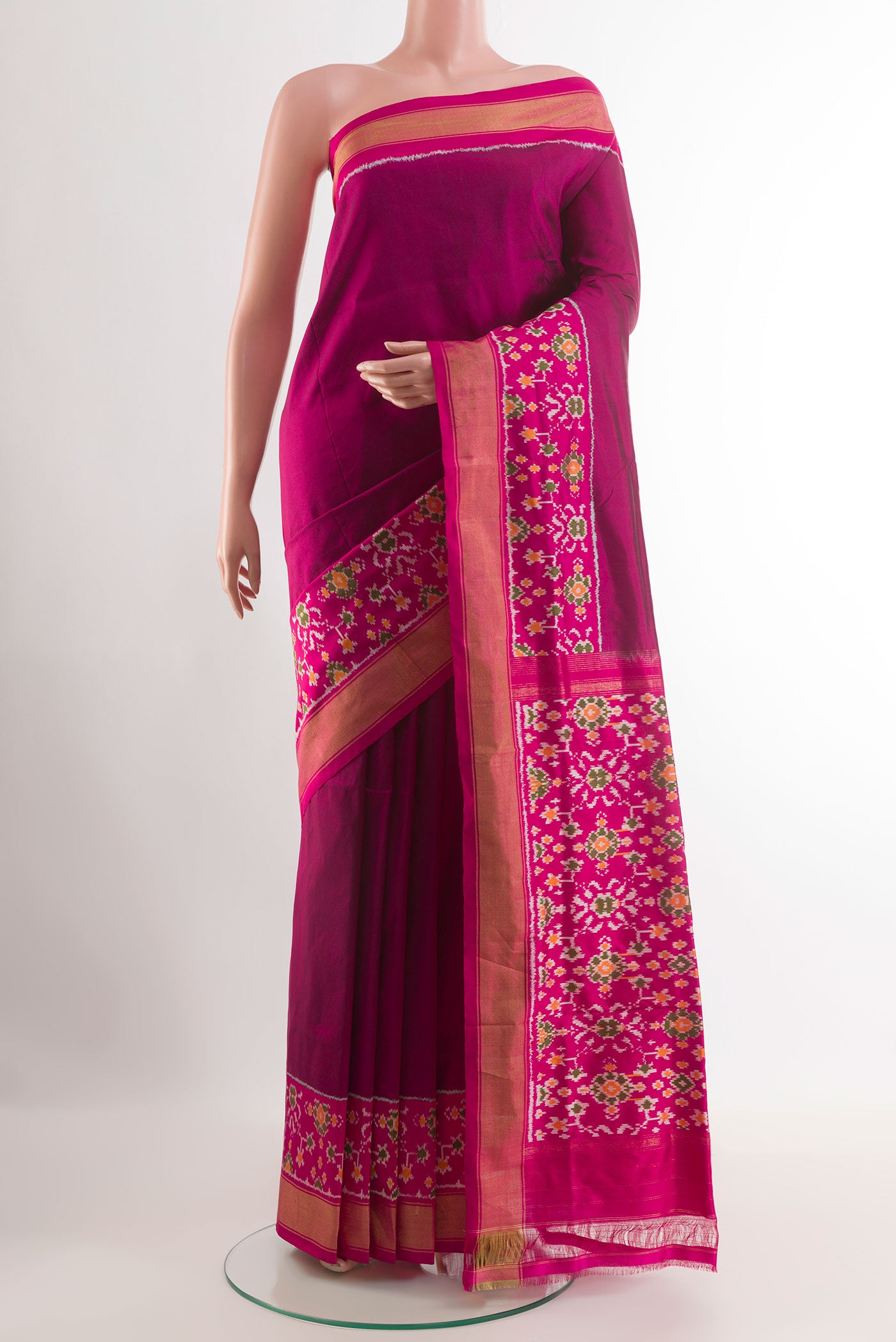 Purple Pochampally Silk Saree with Plain Body and Zari Border.  displayed on a mannequin
